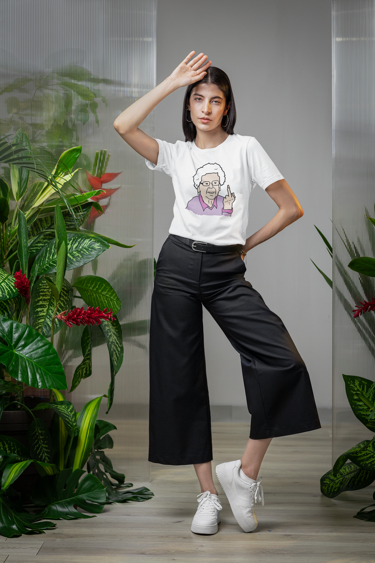 Granny middle finger tee in white, woman wearing it among plants, funny sarcastic gift for coworkers