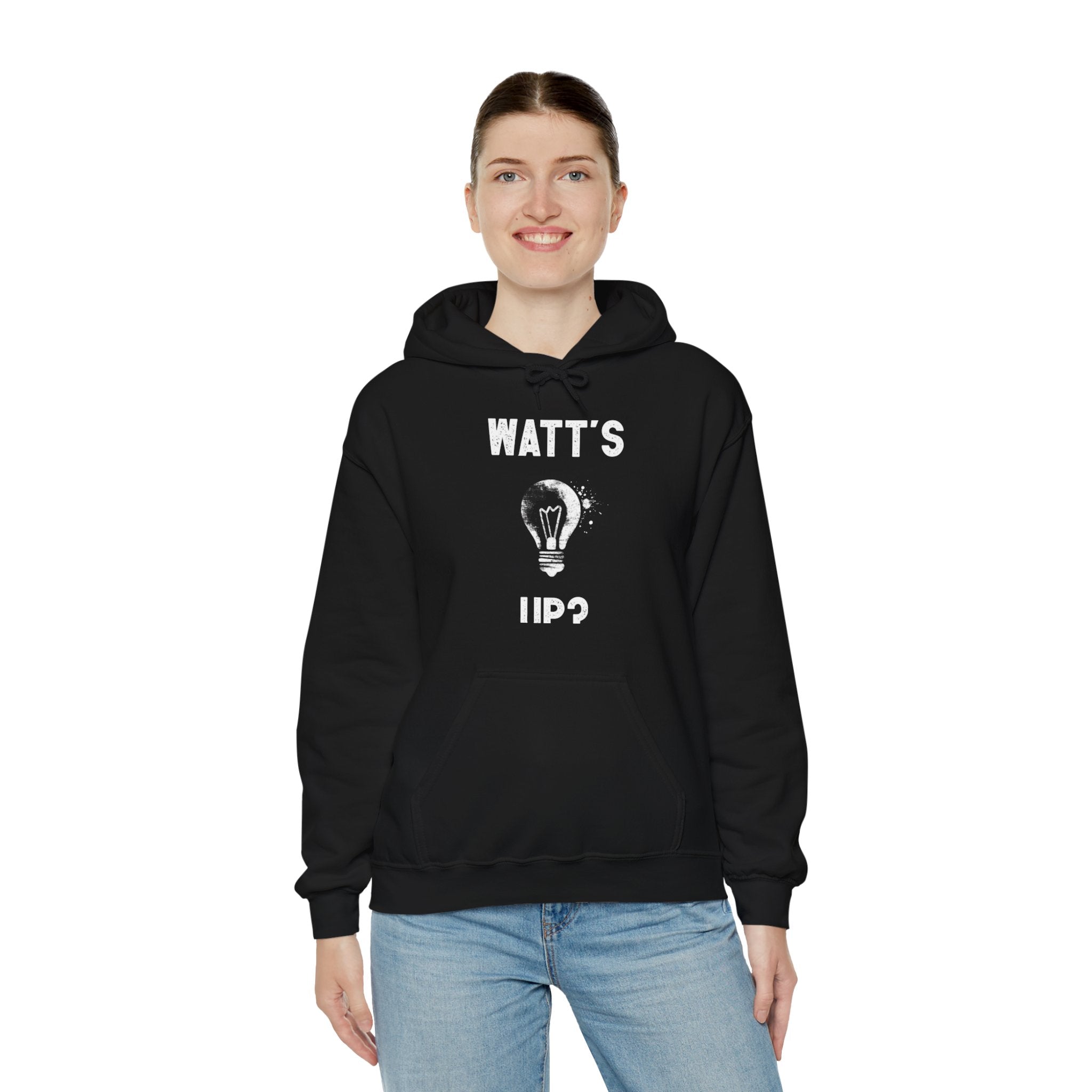 A fashion lover sporting a Watts Up - Hooded Sweatshirt with the text "WATT'S UP?" and a lightbulb graphic on the front.