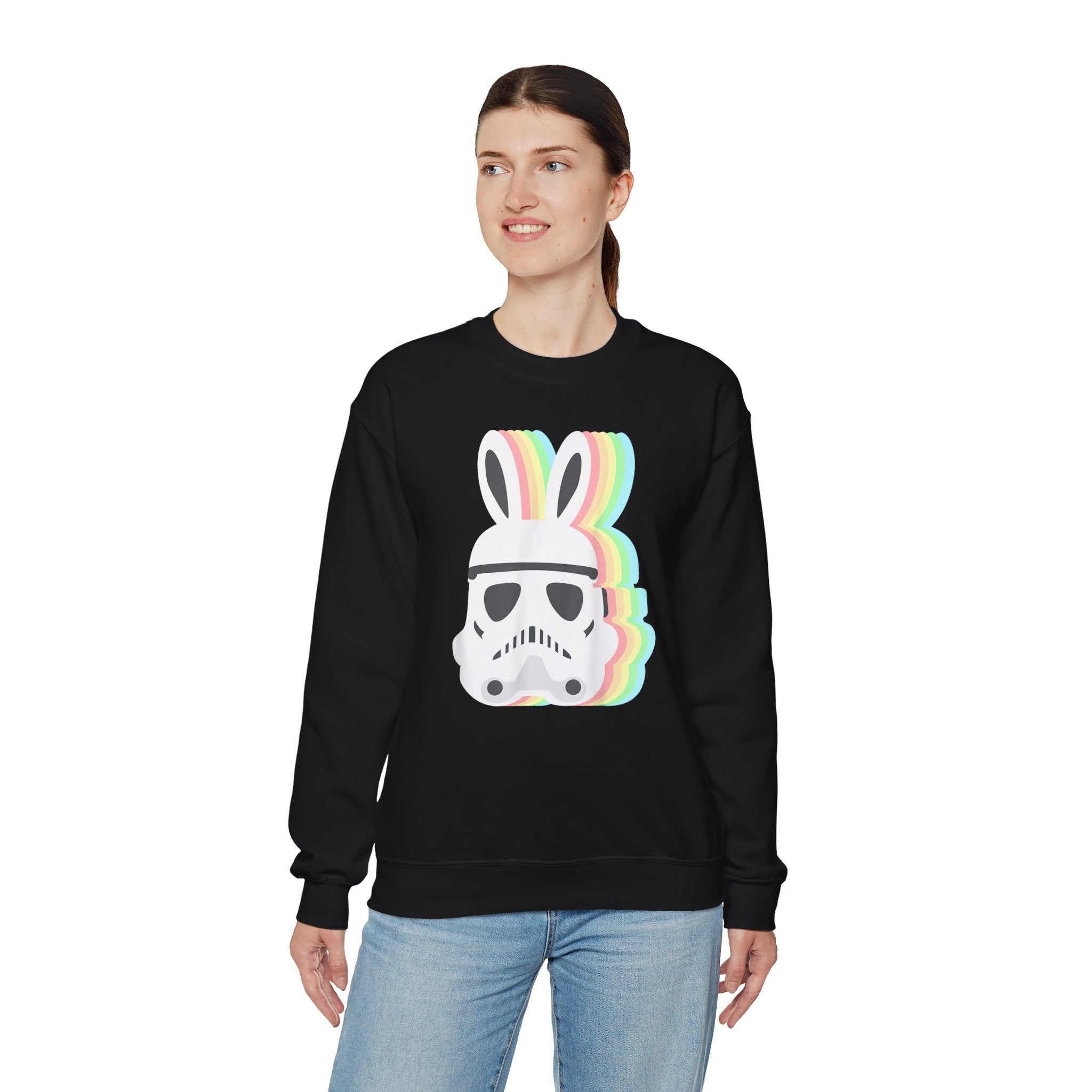 Person wearing a black Star Wars Easter Stormtrooper - Sweatshirt featuring an Easter Stormtrooper helmet with rainbow bunny ears, standing against a plain white background.