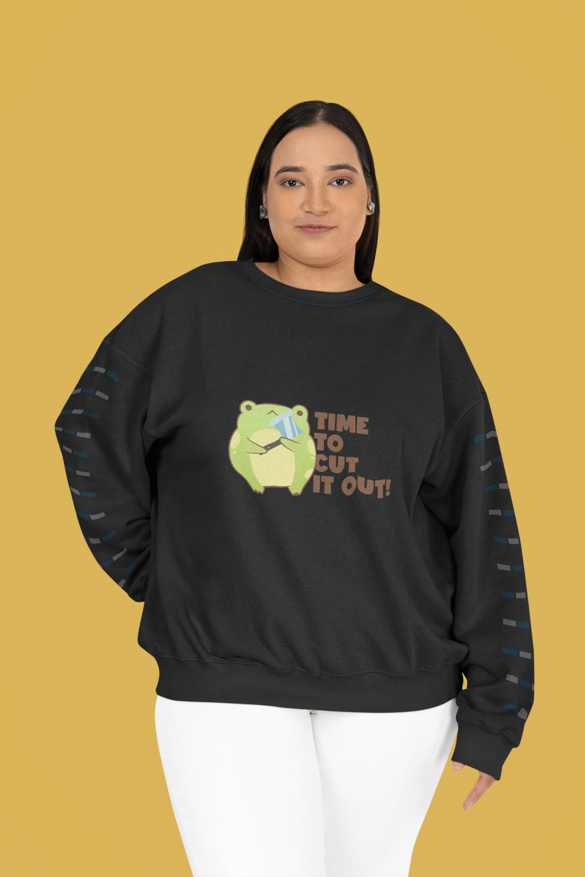 'Time to Cut It Out' frog sweatshirt in charcoal, woman wearing it outdoors, funny pun gift idea