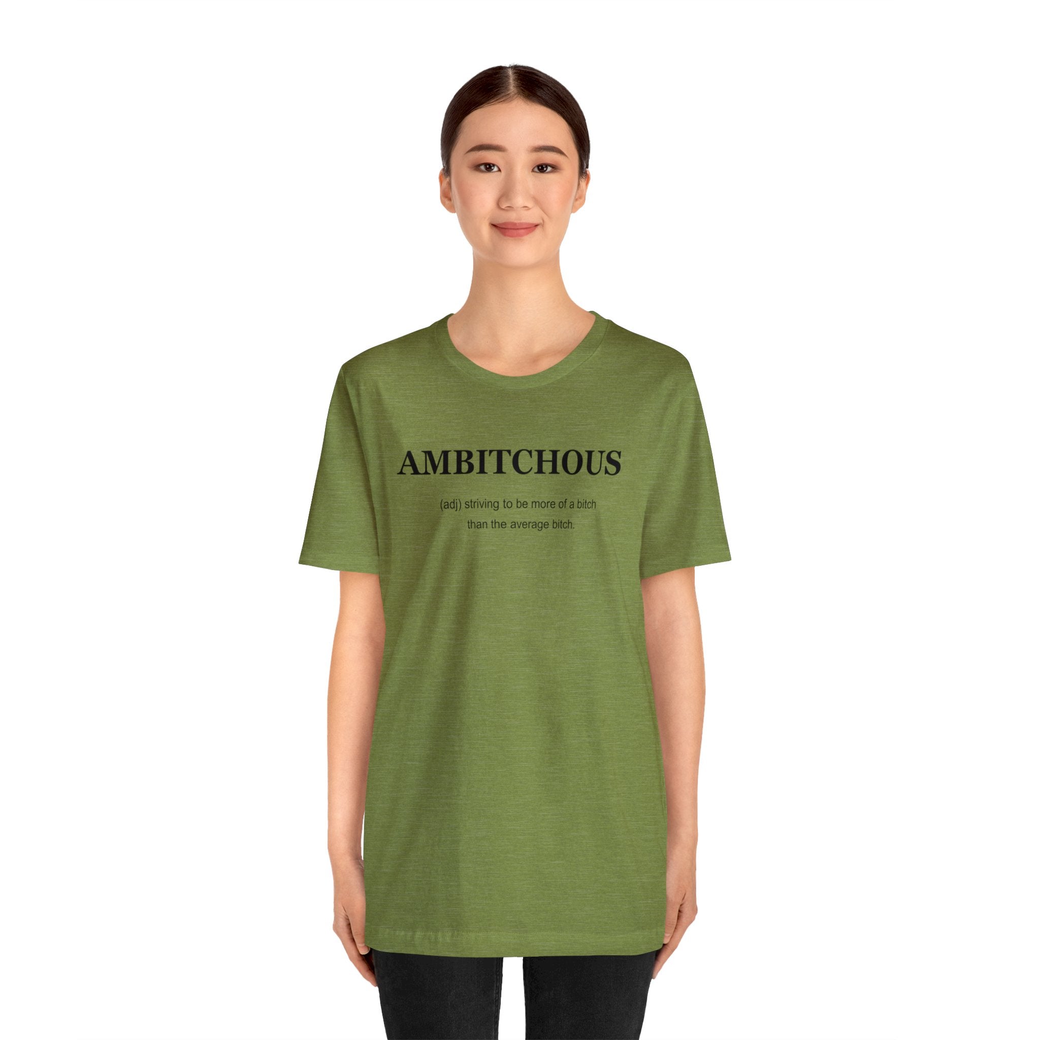 A woman wearing an empowering green Ambitchious T Shirt.