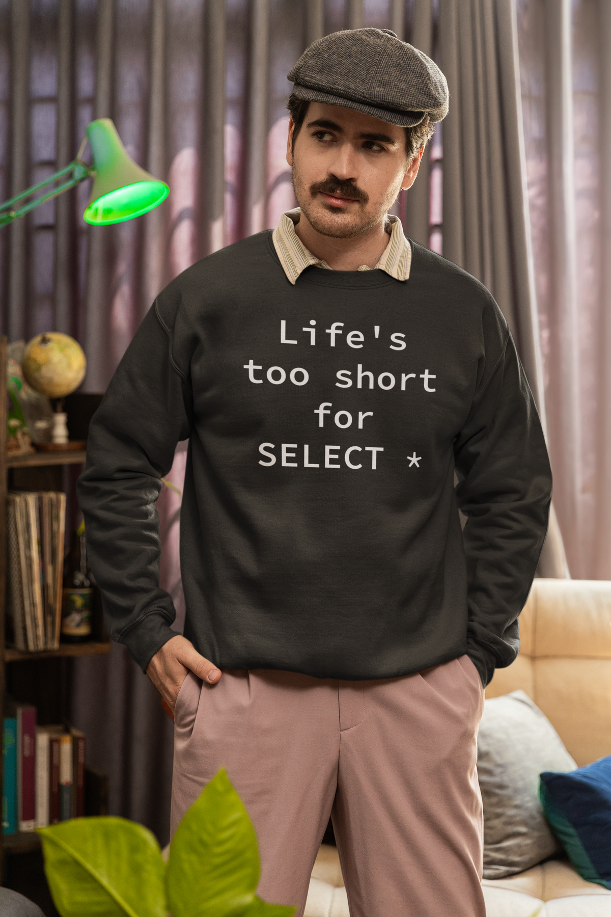 'Life's Too Short for SELECT *' sweatshirt in dark heather, man wearing it indoors with hat, funny gift for developers