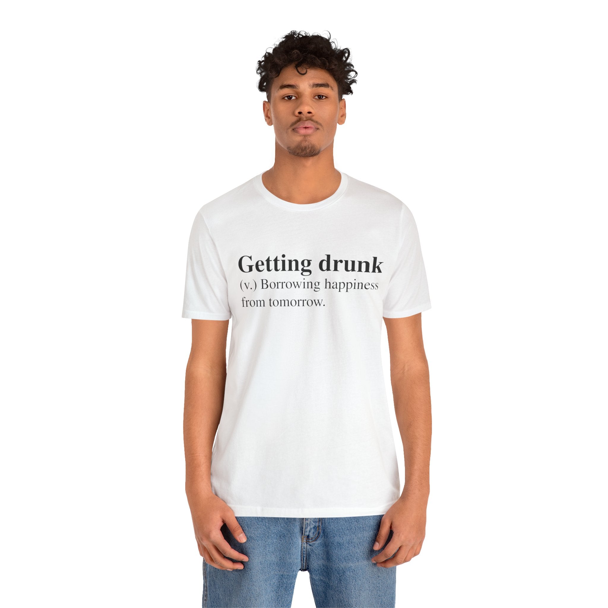 Young man wearing a Getting Drunk T-Shirt with the text "getting drunk (v.) borrowing happiness from tomorrow," featuring a quality print on soft cotton.
