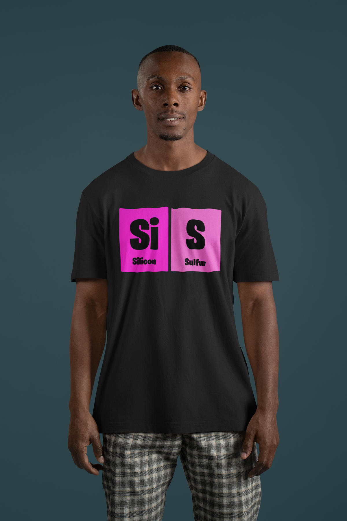 'Sis' periodic table t-shirt in black, man wearing it on teal background, funny sisters pun gift
