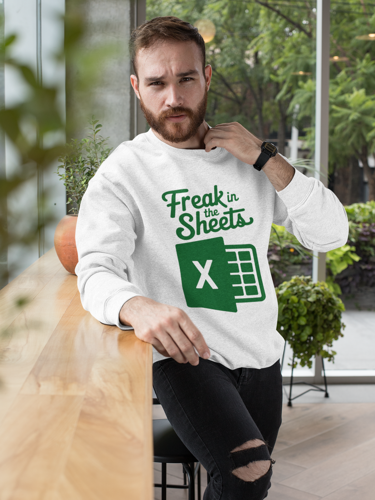 'Freak In The Sheets' sweatshirt in white, bearded man sitting indoors wearing it, funny Excel lover gift