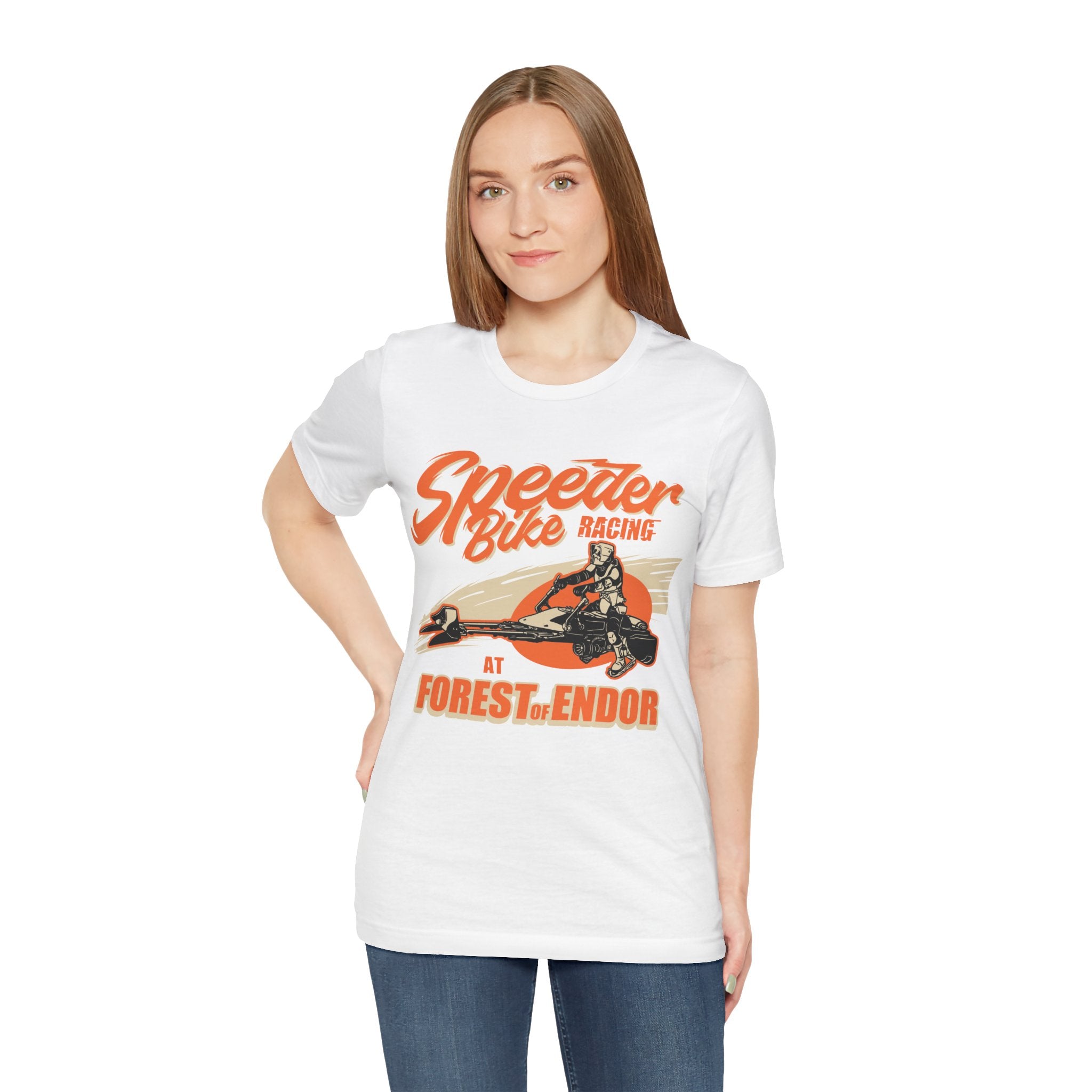 Woman wearing a white Speeder Bike Racing tee with "Speeder Bike Racing at Forest of Endor" graphic, featuring a silhouette of a speeder bike.