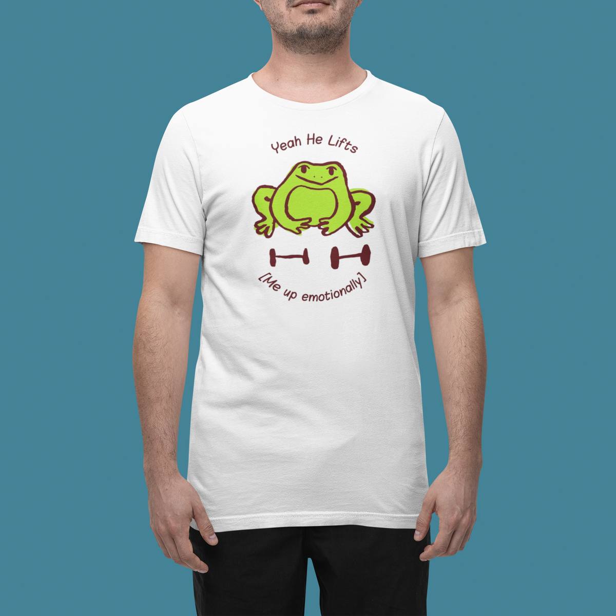 'Yeah He Lifts' t-shirt in white, man wearing it in a studio, T-Shirt mockup, Geekpsters