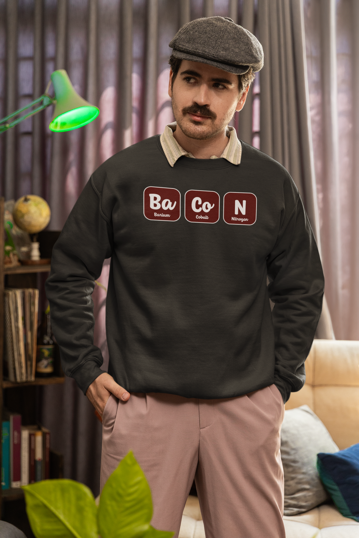 Ba-Co-N periodic table bacon element pun crewneck sweatshirt, flat lay with the graphic centered