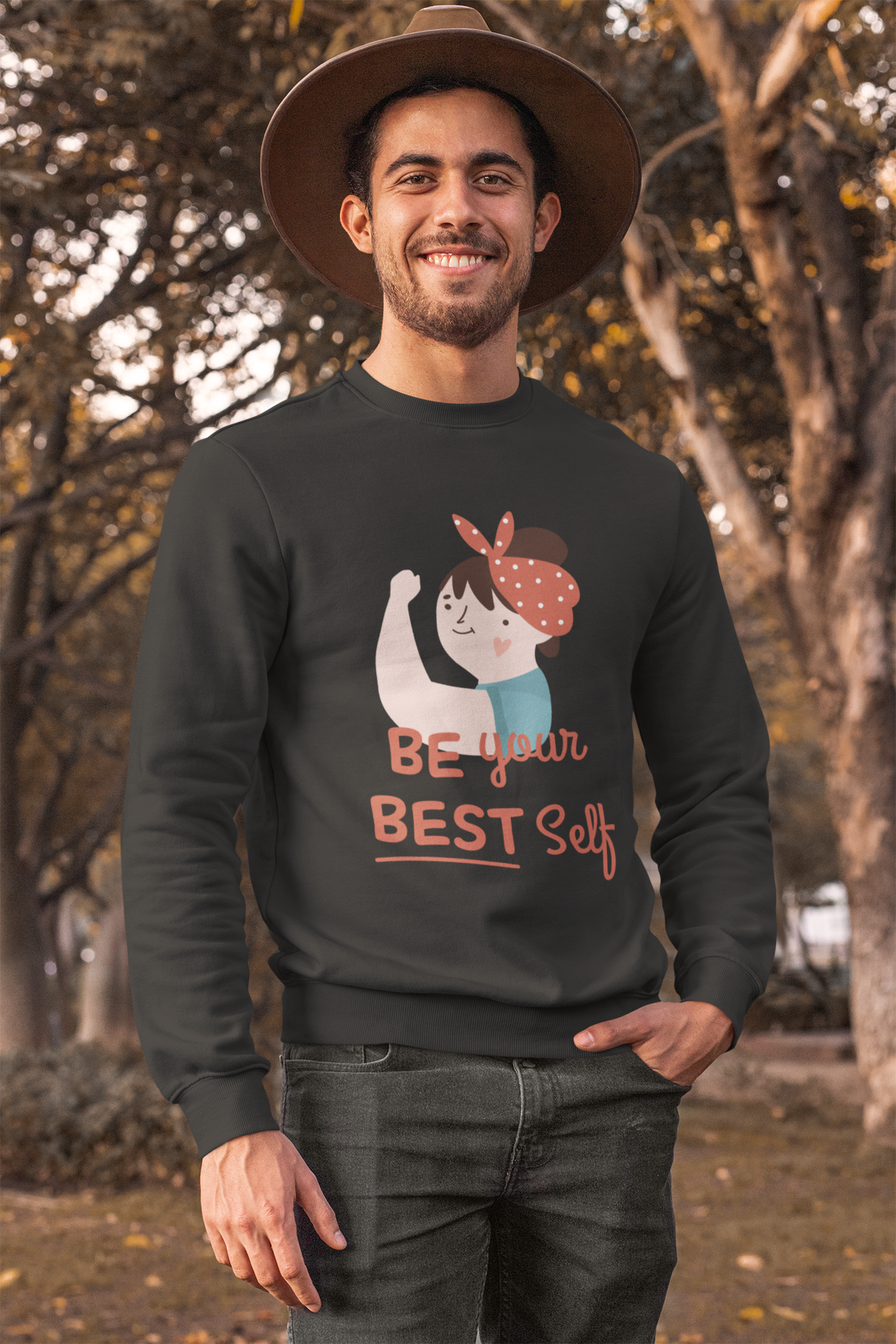 Be Your Best Self sweatshirt in black, man in a hat wearing it outdoors, motivational gift