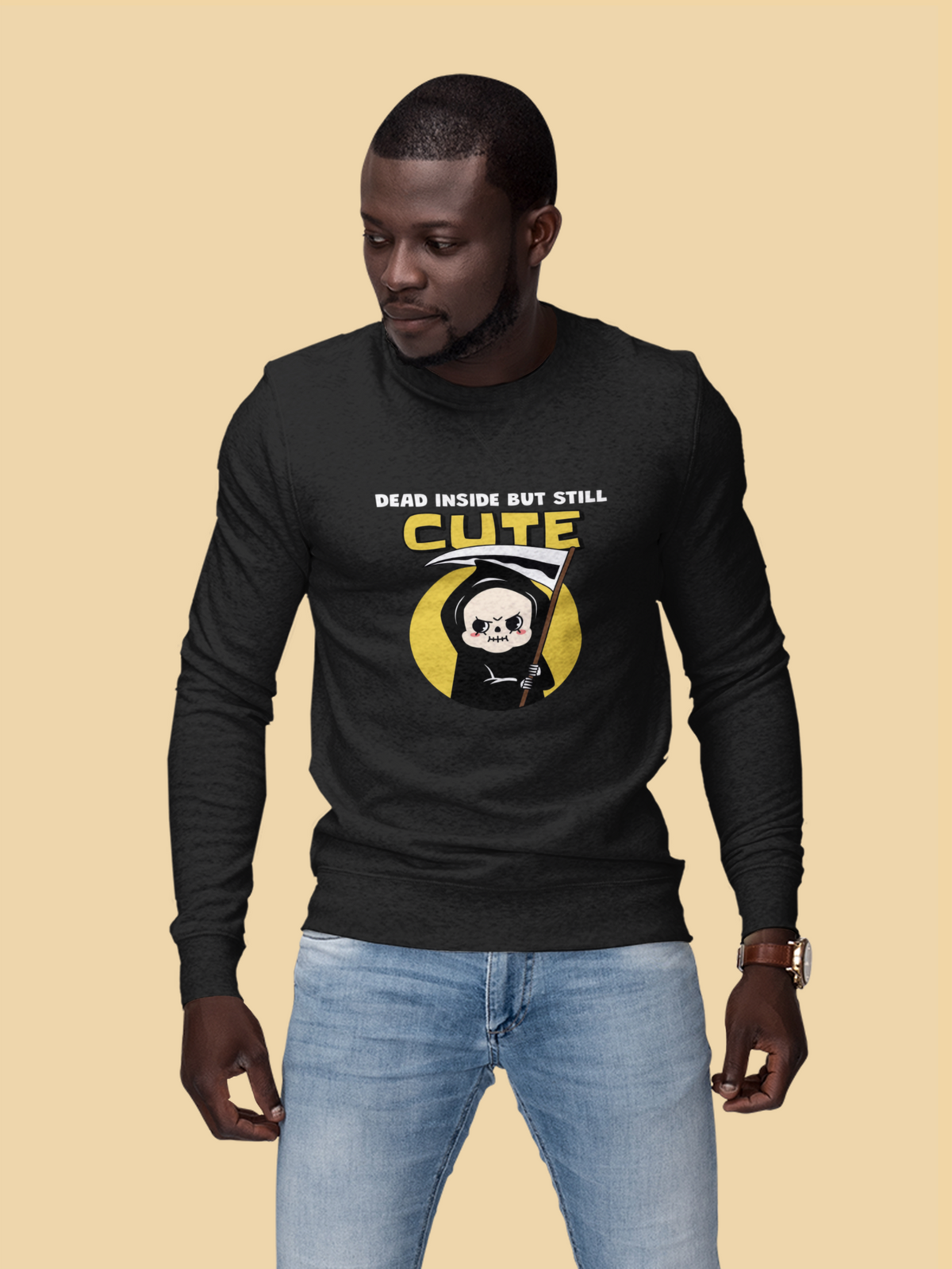 'Dead Inside but Still Cute' reaper sweatshirt in black, man wearing it in a studio setting, funny gothic pun gift