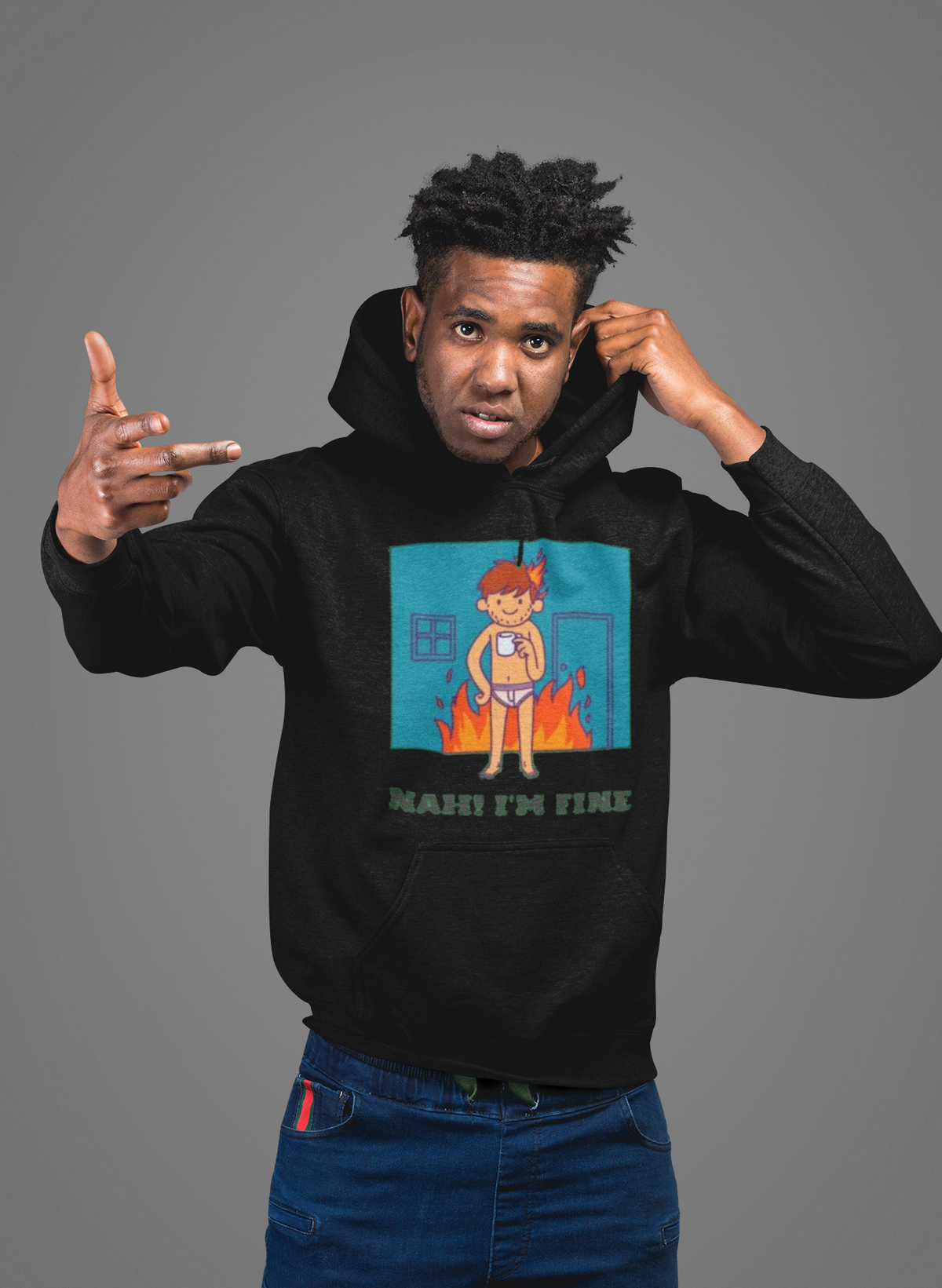 'NAH I'm Fine' hoodie in black, man wearing it in a studio, Hoodie mockup, Geekpsters