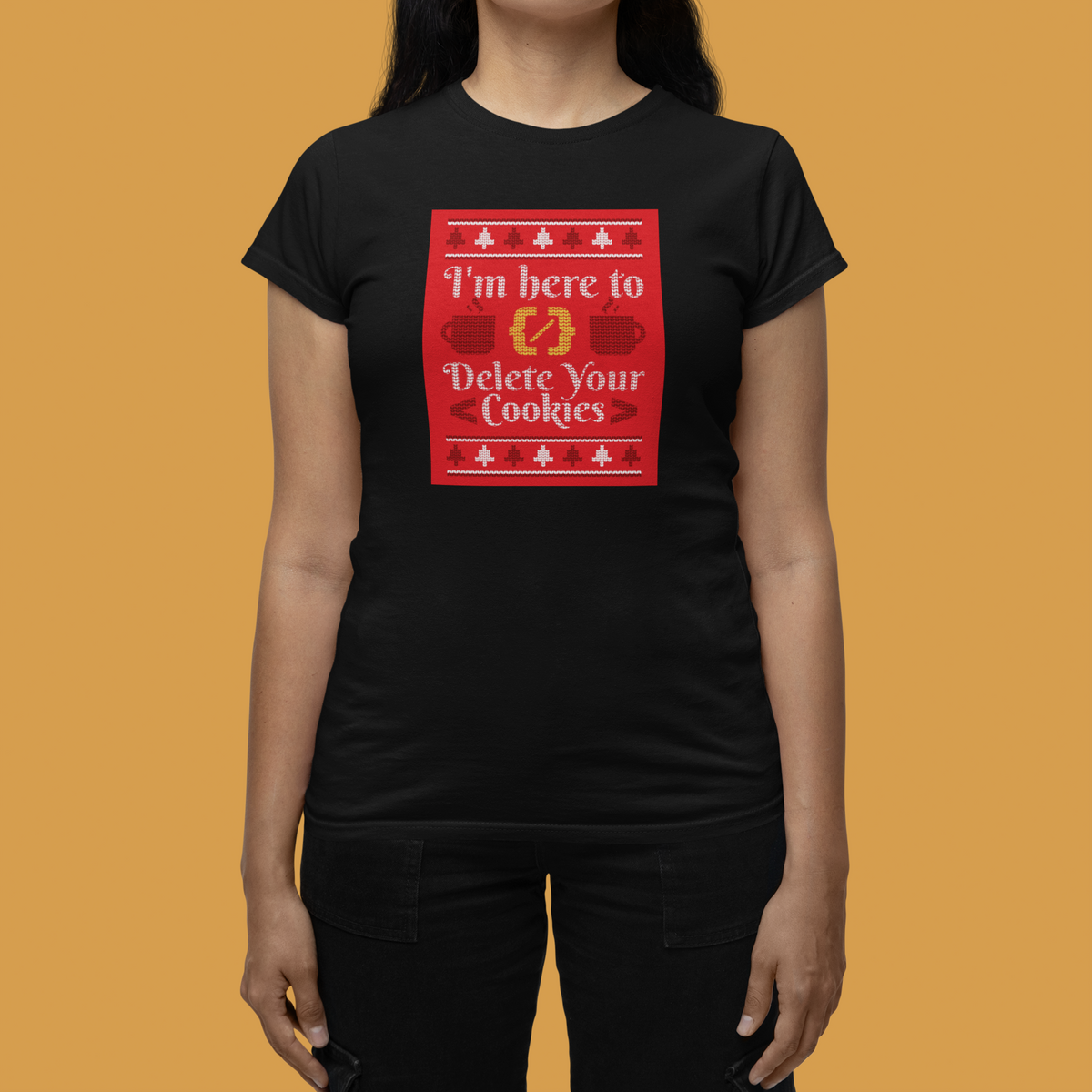 'I'm Here to Delete Your Cookies' Women's T-Shirt in black, close-up on a woman against an orange backdrop