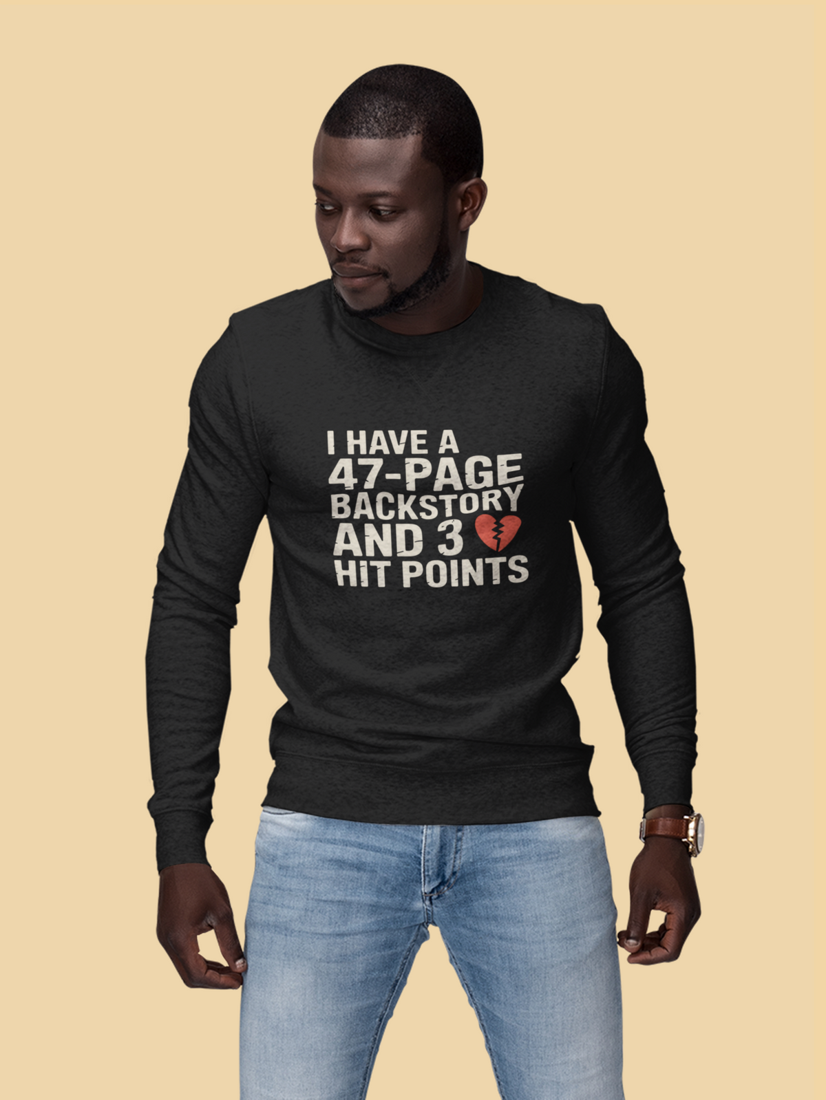 'I Have a 47-Page Backstory and 3 Hit Points' black sweatshirt worn by man on yellow backdrop, gift