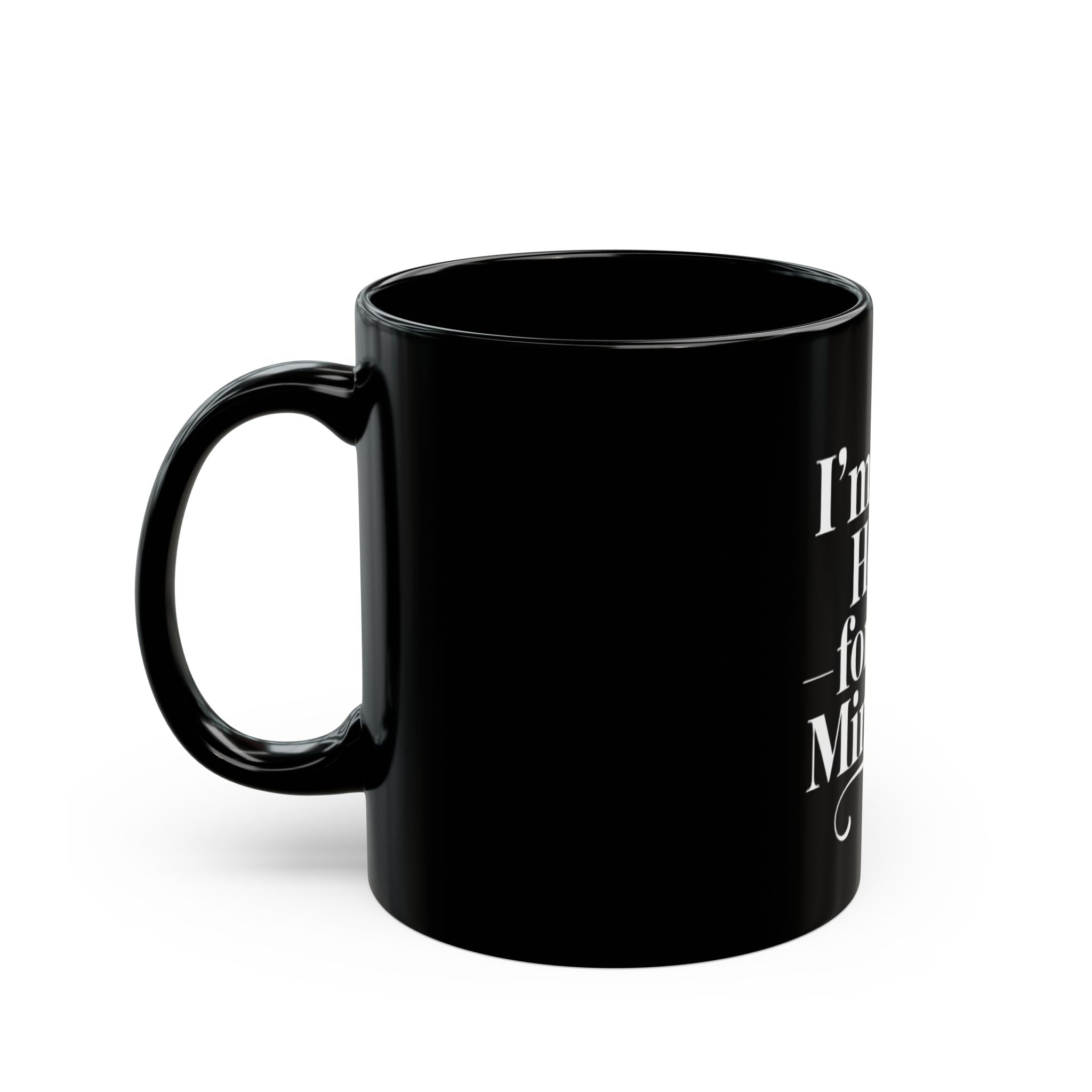 A black ceramic mug displaying the text "I'm just here for the minutes white" on the right side, shown against a plain white background—ideal for coding mug fans.