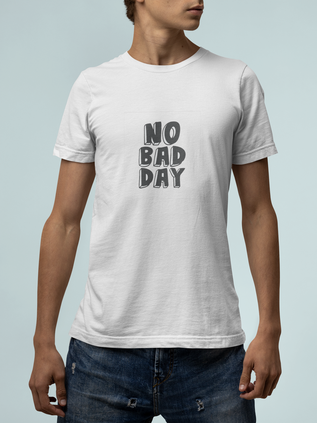 'No Bad Day' t-shirt in white, man wearing it with jeans, T-Shirt mockup, Geekpsters