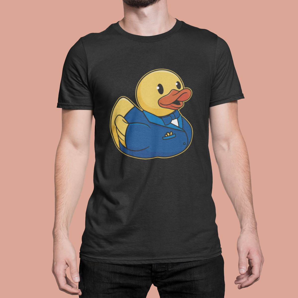 Groom duck t-shirt in dark heather gray, man model wearing it against a peach background, funny wedding gift
