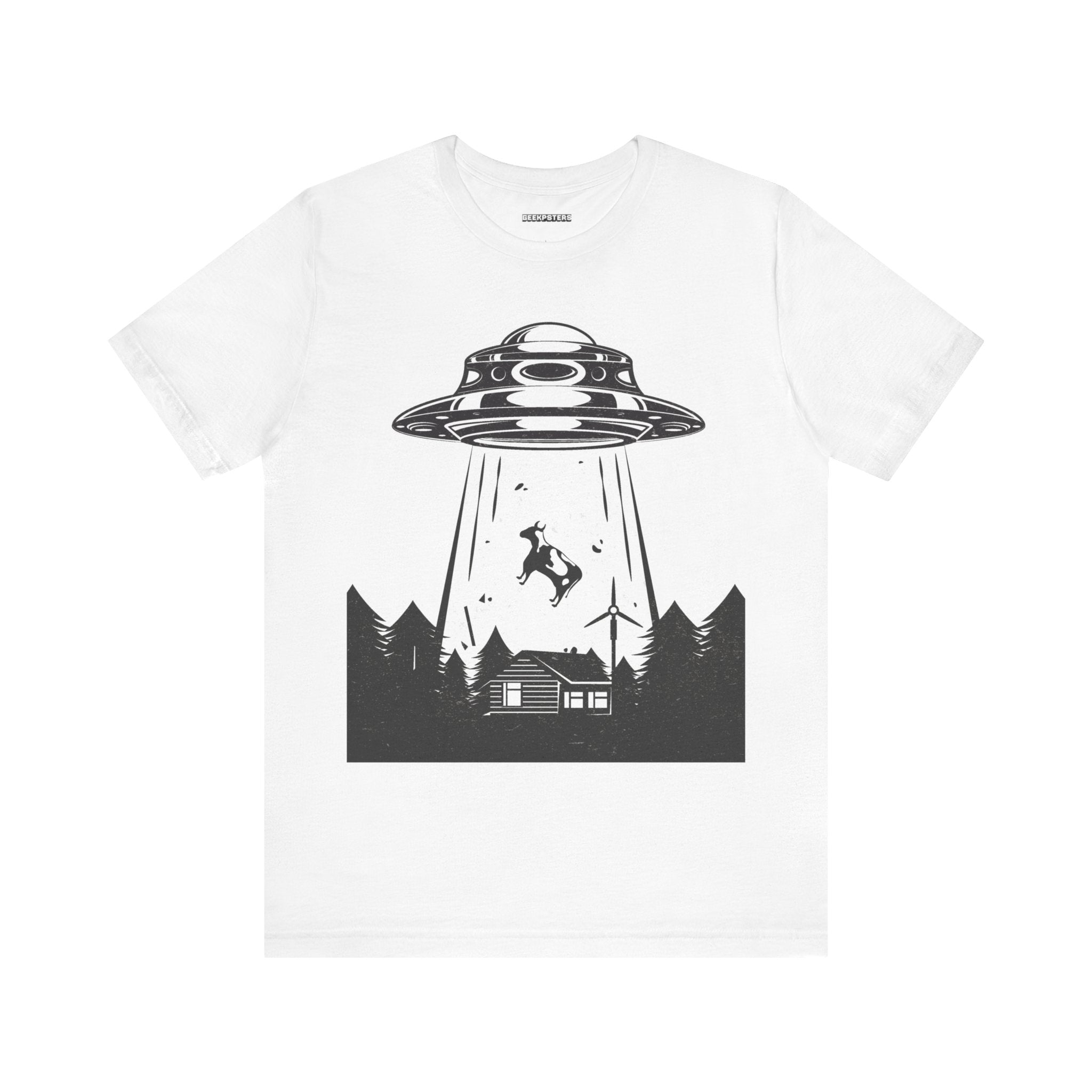 A must-have for sci-fi enthusiasts, the Alien Abduction T-shirt features a black and white illustration of a UFO abducting a deer above a cabin set among trees. It's the perfect geeky accessory to express your out-of-this-world style.