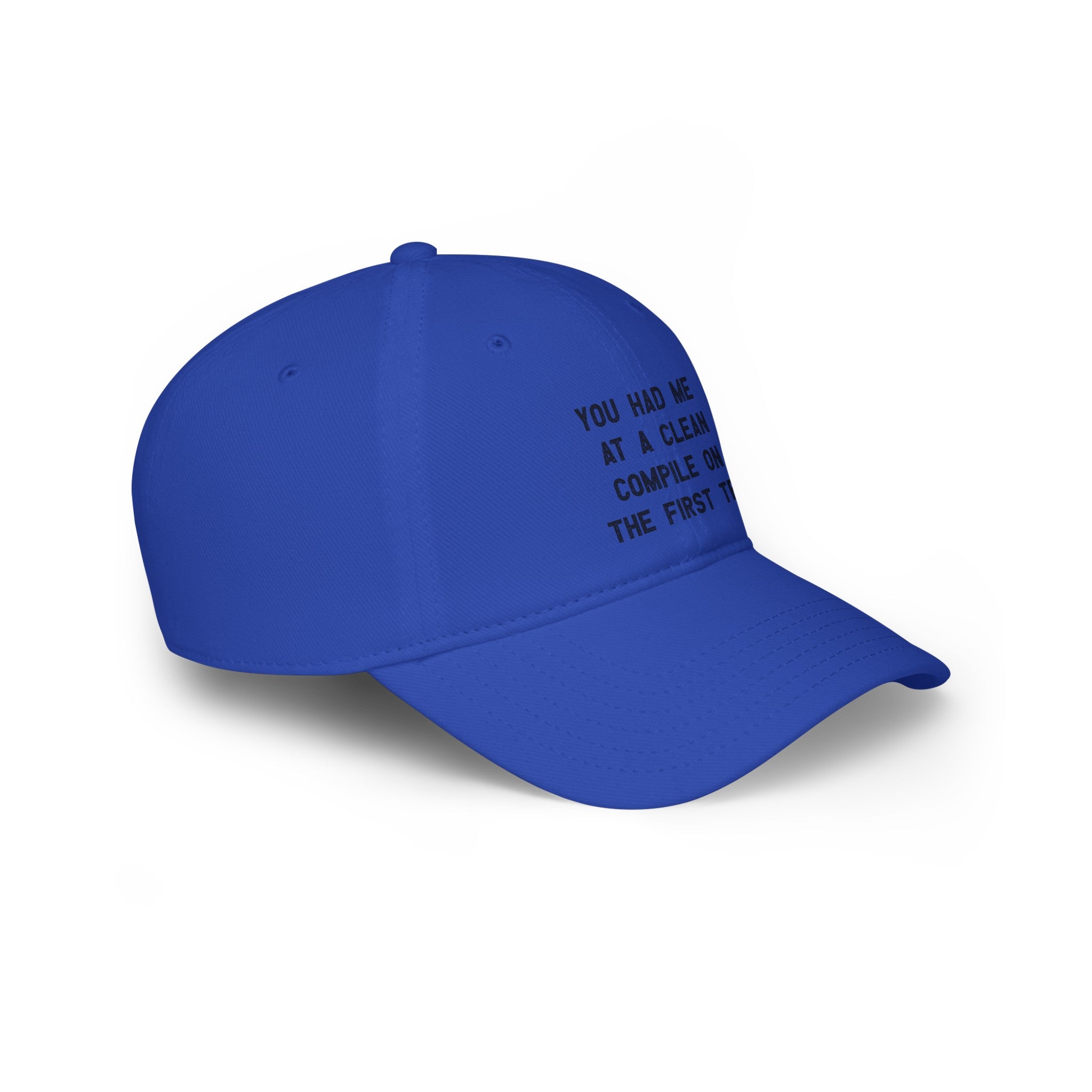 Blue baseball cap with black text on the front panel that reads, "YOU HAD ME AT A CLEAN COMPILE ON THE FIRST TRY." Perfect for those who appreciate coder lingo.
