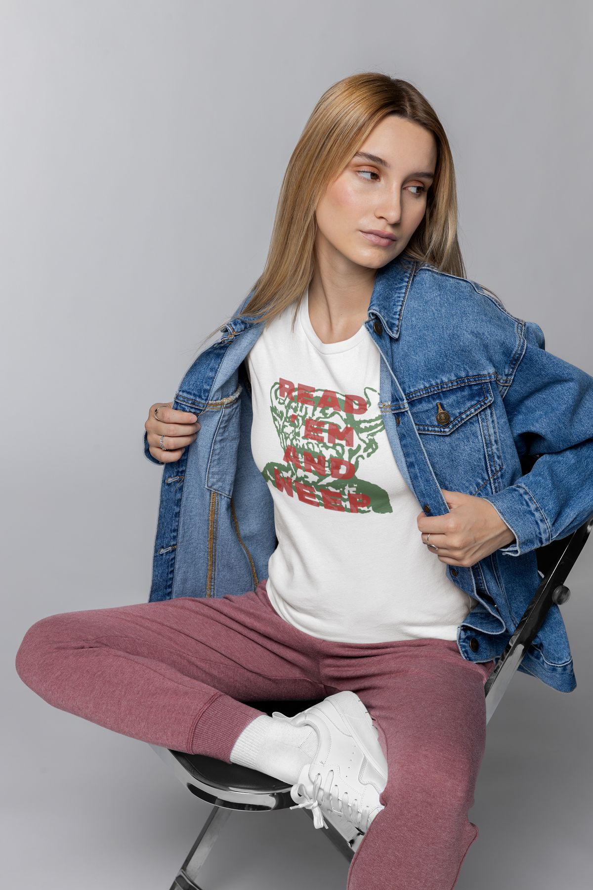 'Read Them And Weep' t-shirt in white, woman in denim jacket wearing it, funny gambler gift shirt