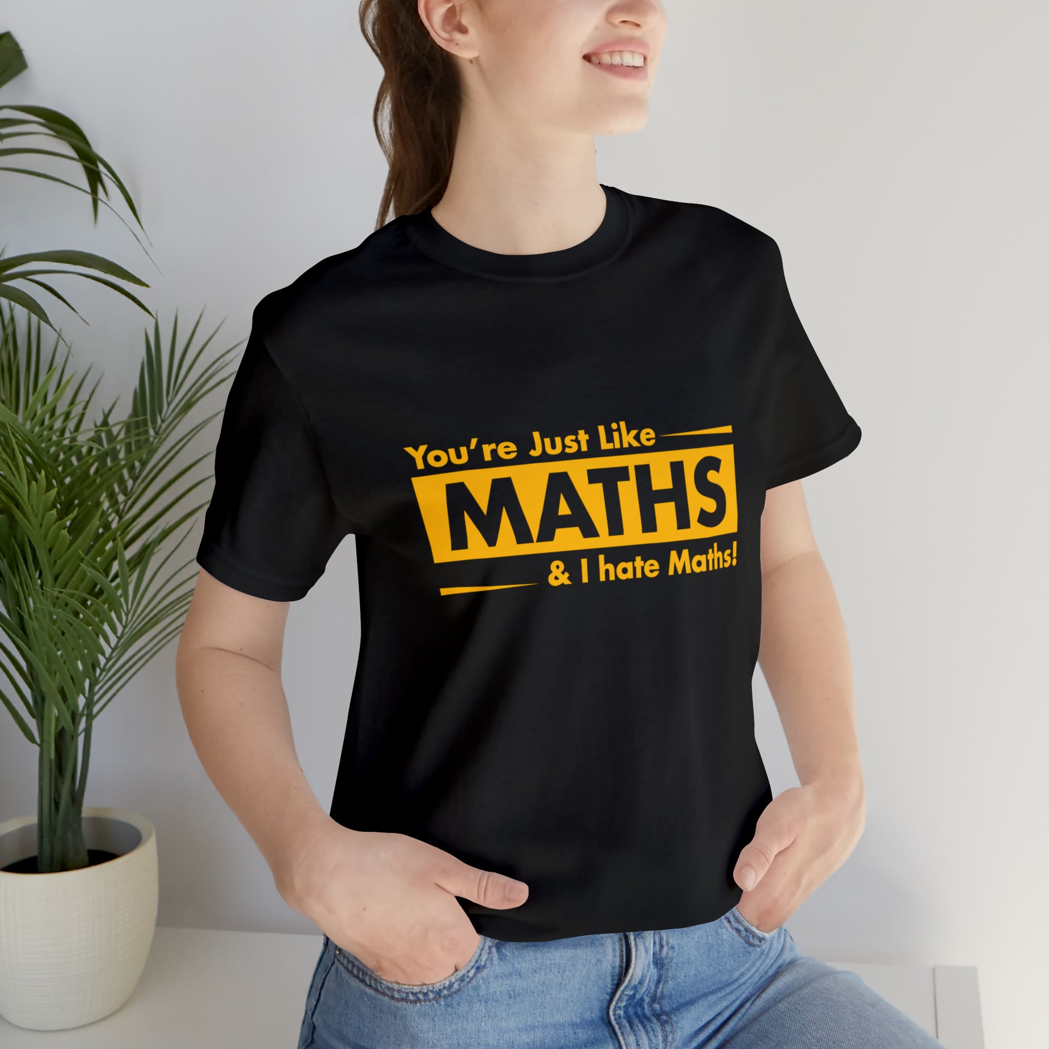 A woman with a great fashion sense wearing a "You are just like maths and I hate maths" T-shirt.