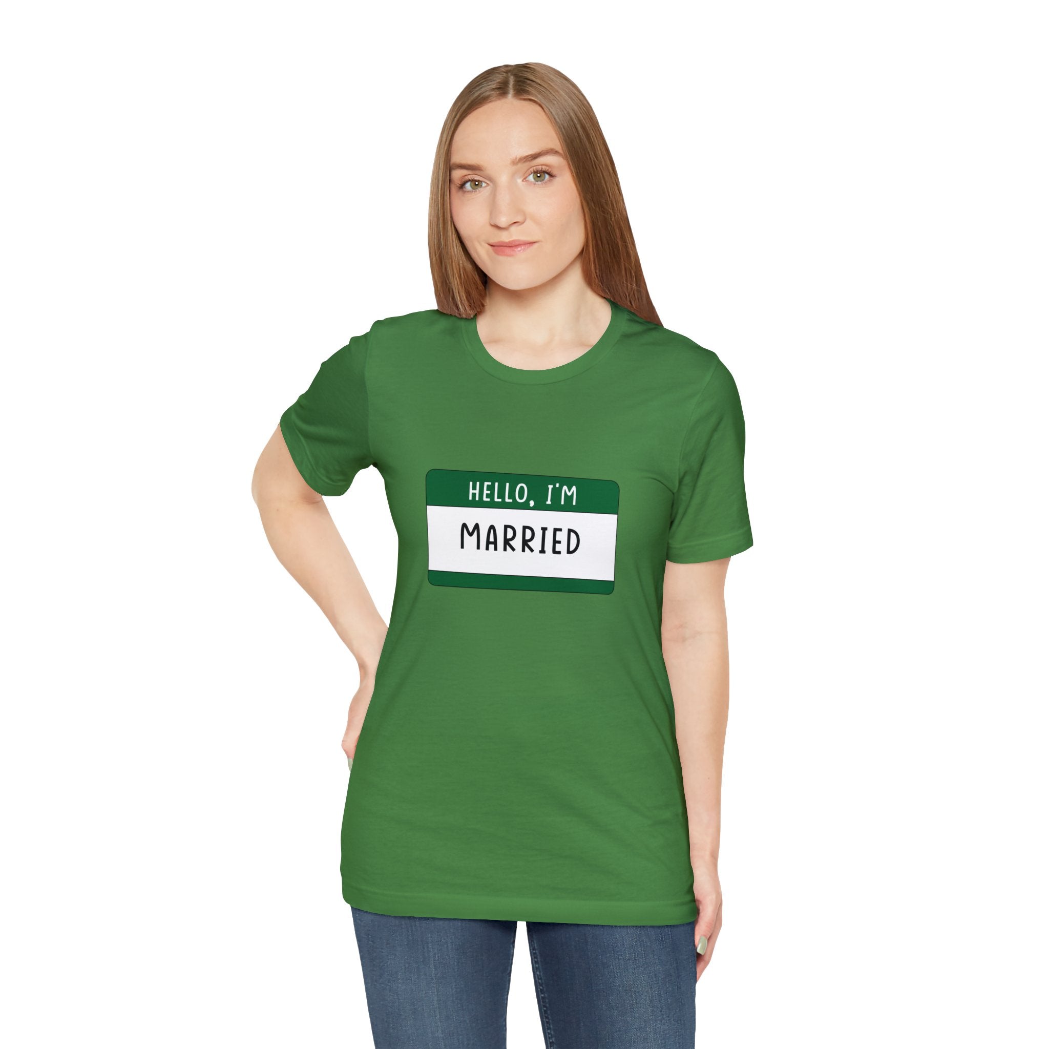 Young woman in a green Hello, I'm Married T-Shirt with a badge printed on the front.