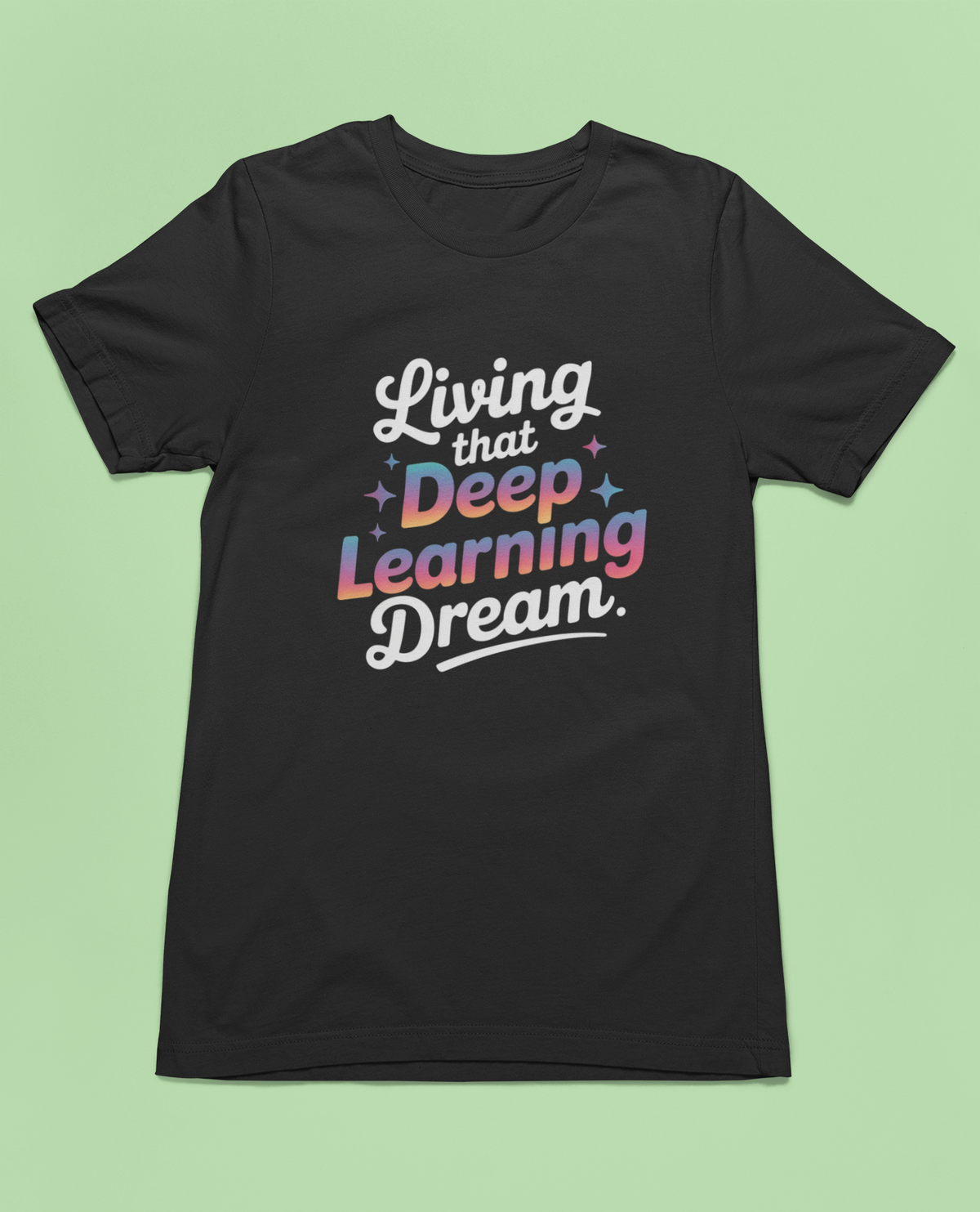 'Living that Deep Learning Dream' tee in black, flat lay front on green background, gift for coders