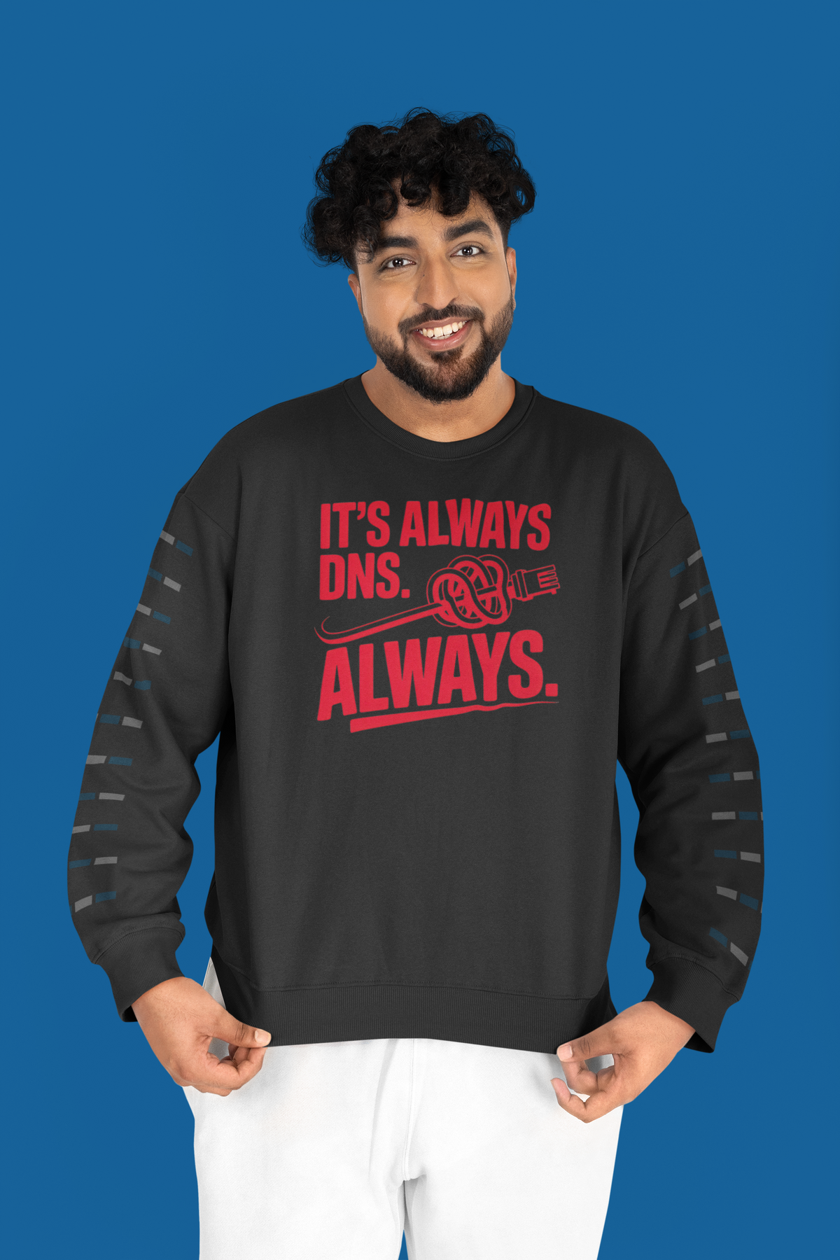 'It's Always DNS. Always.' black sweatshirt worn by man on blue backdrop, funny network gift