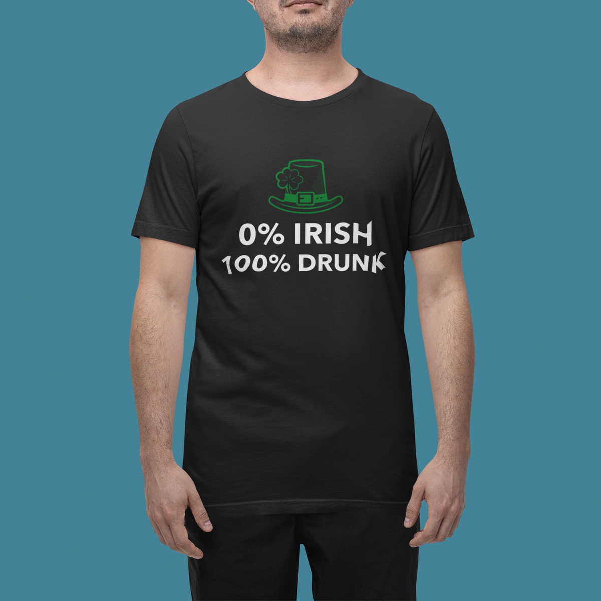 '0% Irish 100% Drunk' t-shirt in black, man wearing it on teal backdrop, funny St Patrick's Day gift for him