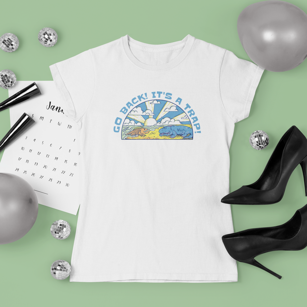 'Go Back It's A Trap' desert t-shirt in white, flat lay lifestyle setting, funny quirky gift shirt