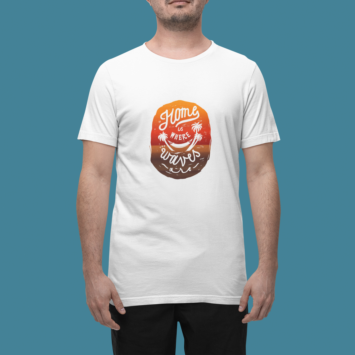 'Home Is Where Waves Are' t-shirt in white, man wearing it in a studio, T-Shirt mockup, Geekpsters