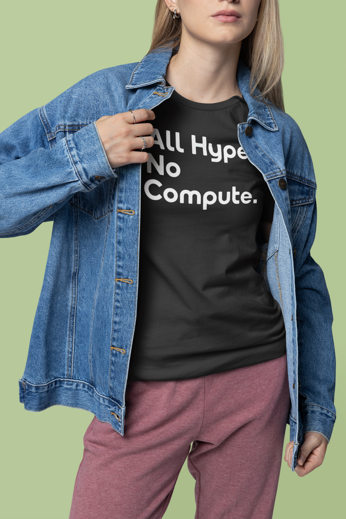 'All Hype. No Compute.' t-shirt in black, woman wearing it under an open denim jacket, gift for developers