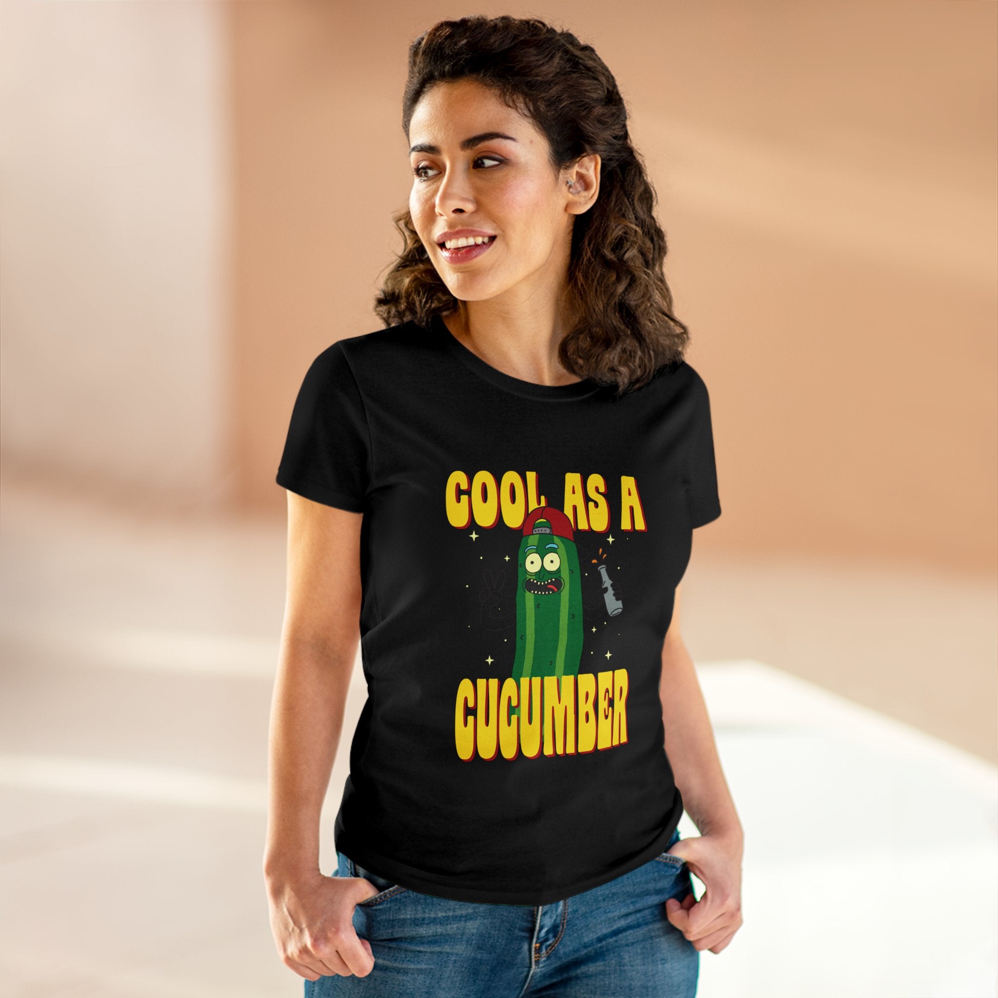 A person wearing a Cool as Cucumber - Women's Tee, sporting a semi-fitted silhouette, standing in a well-lit environment.