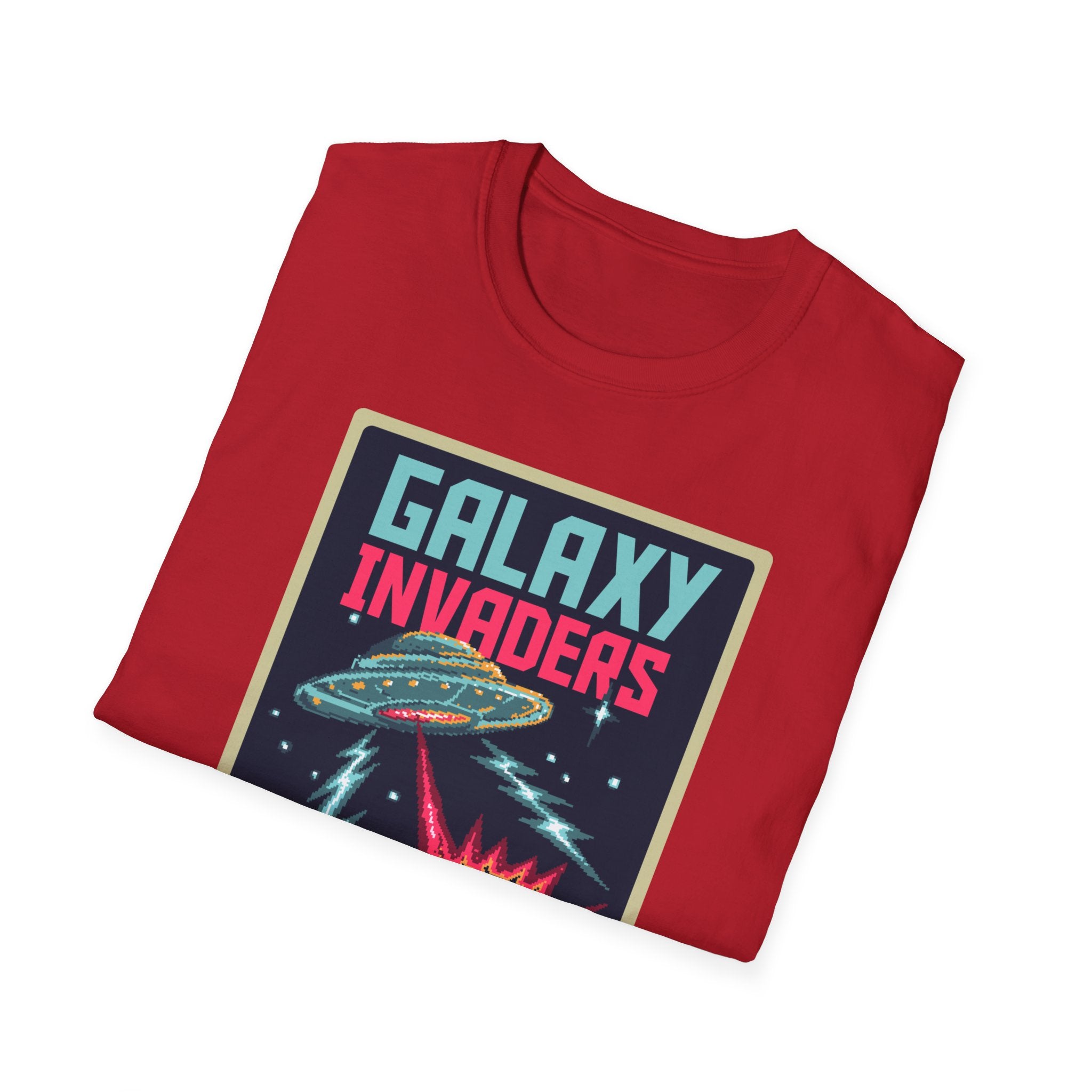 A folded Pixel Galaxy Invaders T-Shirt featuring a retro-style design with a pixelated spaceship, UFO, and lightning bolts in red.