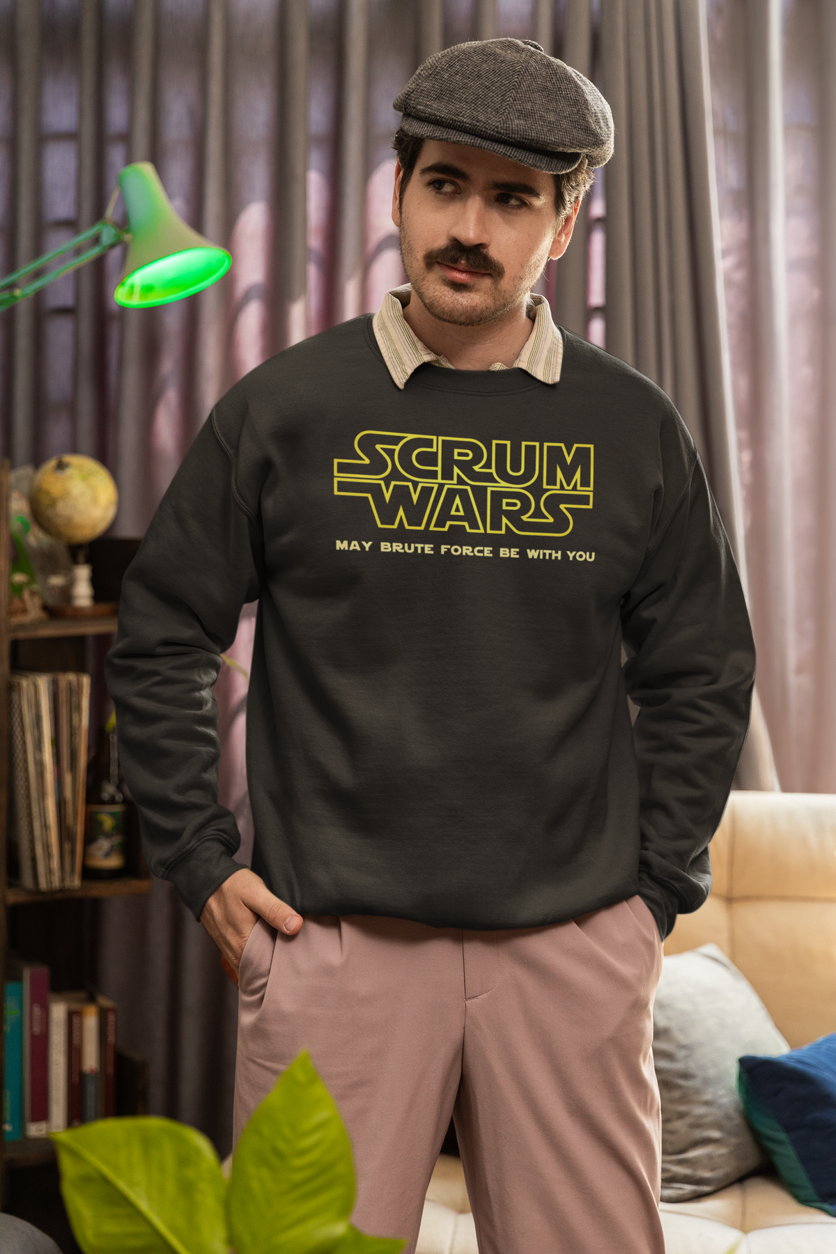 "Scrum Wars" sweatshirt in olive, man wearing it indoors, funny gift for scrum masters