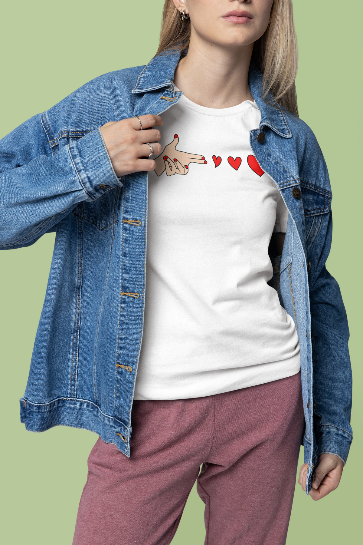 Bang Bang finger gun heart t-shirt in white, woman wearing it under a denim jacket, funny sarcastic gift