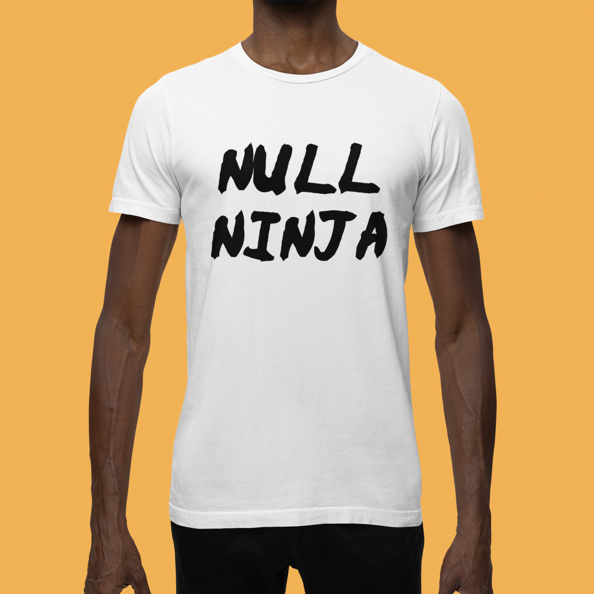 'Null Ninja' T-shirt in white, man wearing it against an orange backdrop, funny programmer tee