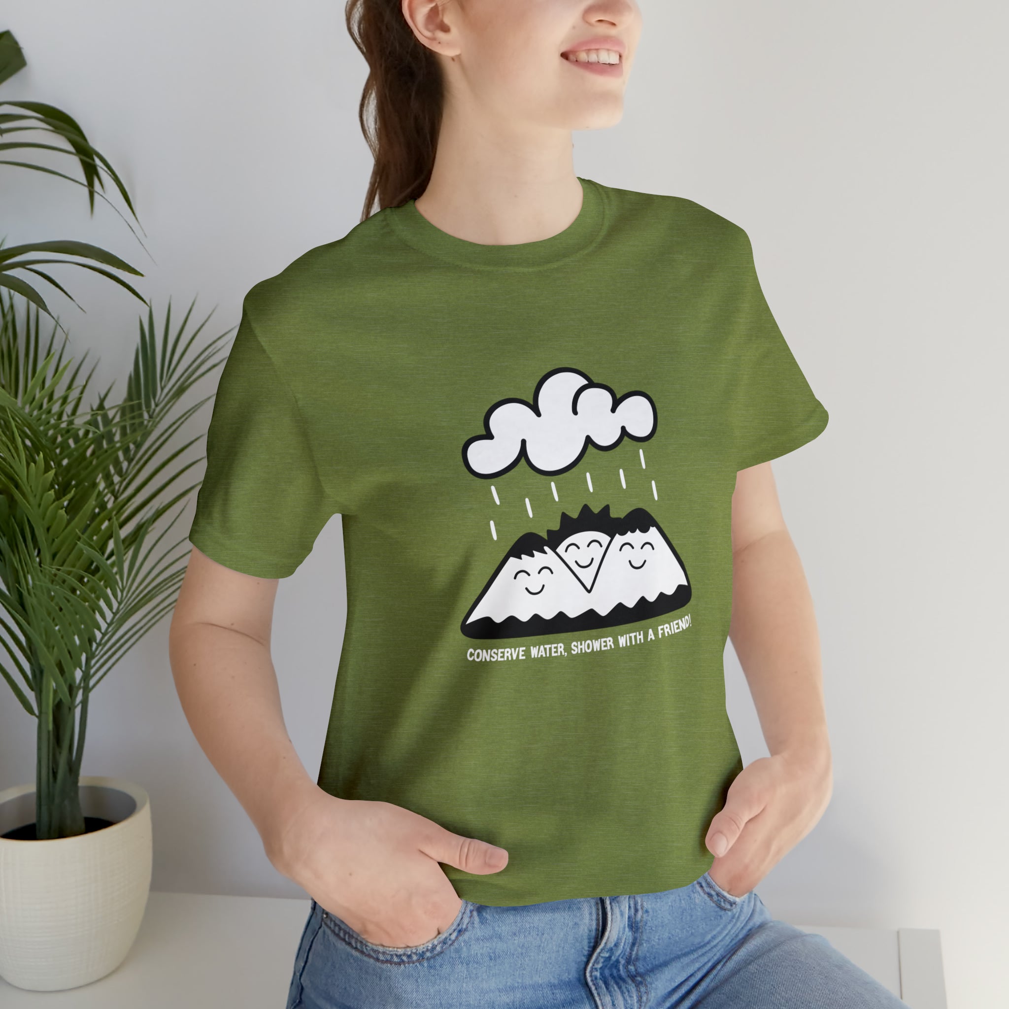 A woman wearing a Conserve Water Shower with a Friend T-Shirt with clouds on it.