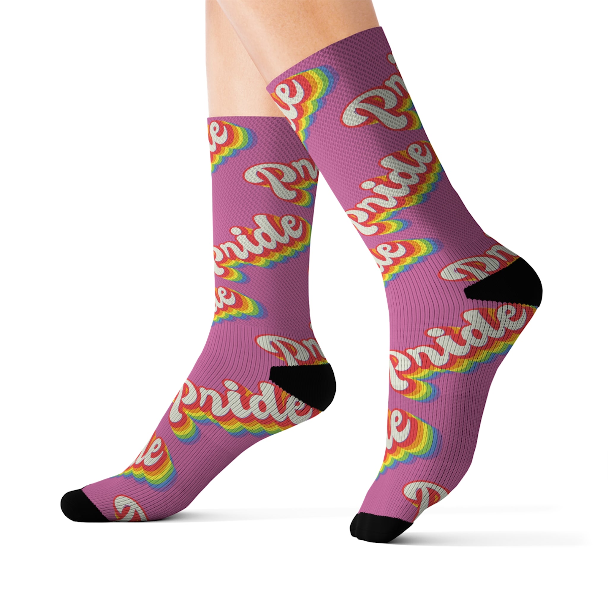 A pair of comfortable Pride Socks with a sublimated print of the word 'pride' in purple.