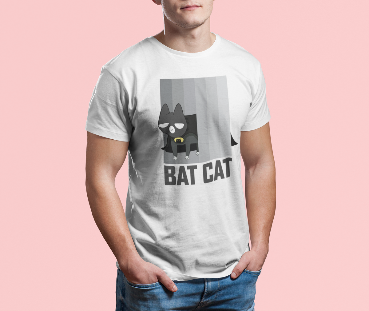 'Bat Cat' parody T-shirt in white, man wearing it against a pink backdrop, funny cat lover gift tee