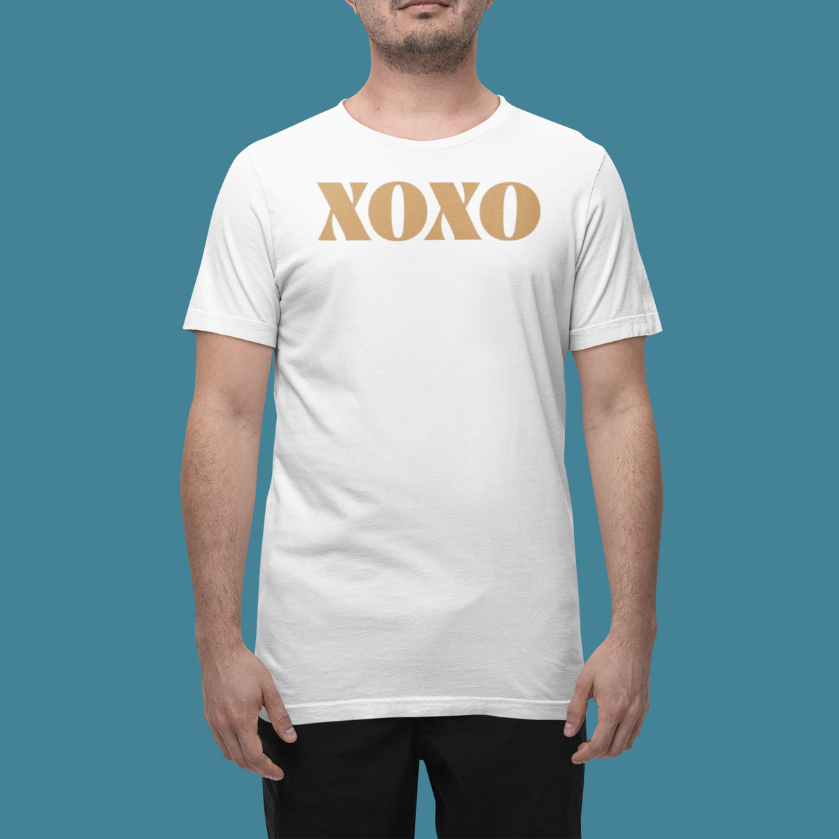 'XOXO' t-shirt in white, man wearing it in a studio, T-Shirt mockup, Geekpsters