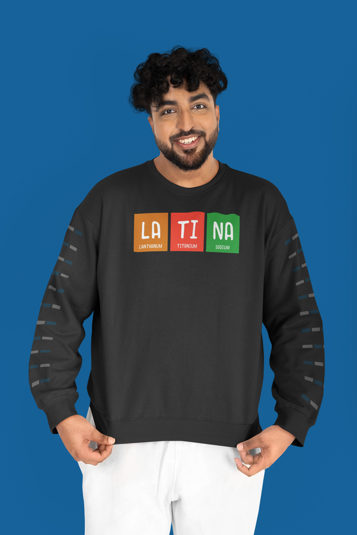 LA-TI-NA periodic table sweatshirt in black, man wearing it against a blue backdrop, funny gift