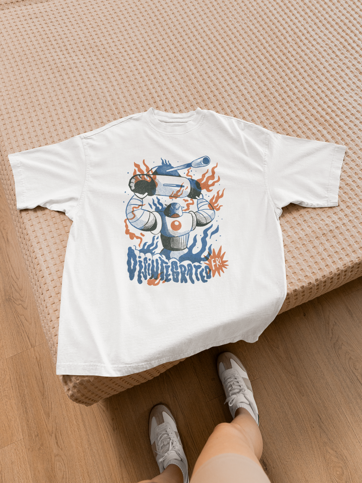 Huge Robot t-shirt in white, flat lay on a wooden bed frame with wicker texture