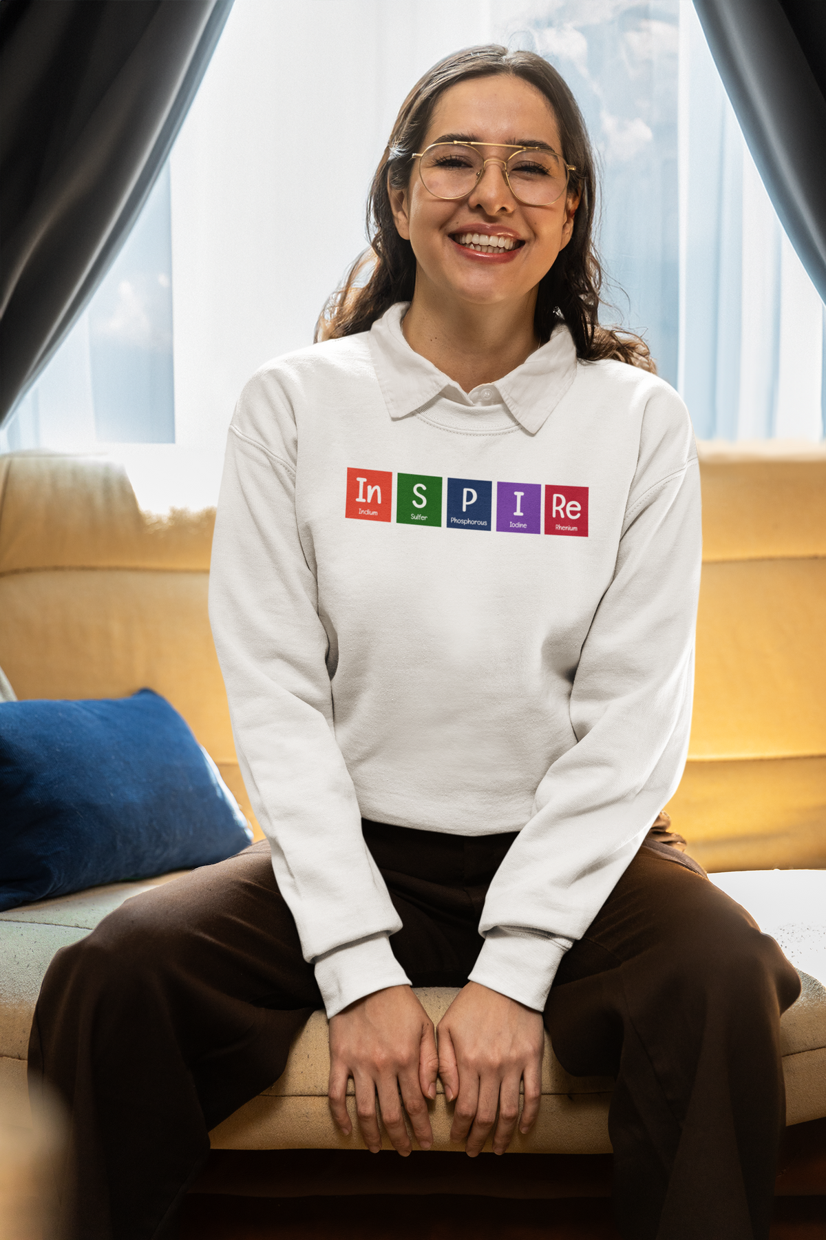 'InSPIRe' periodic table sweatshirt in white, woman wearing it by a window, funny chemistry teacher gift