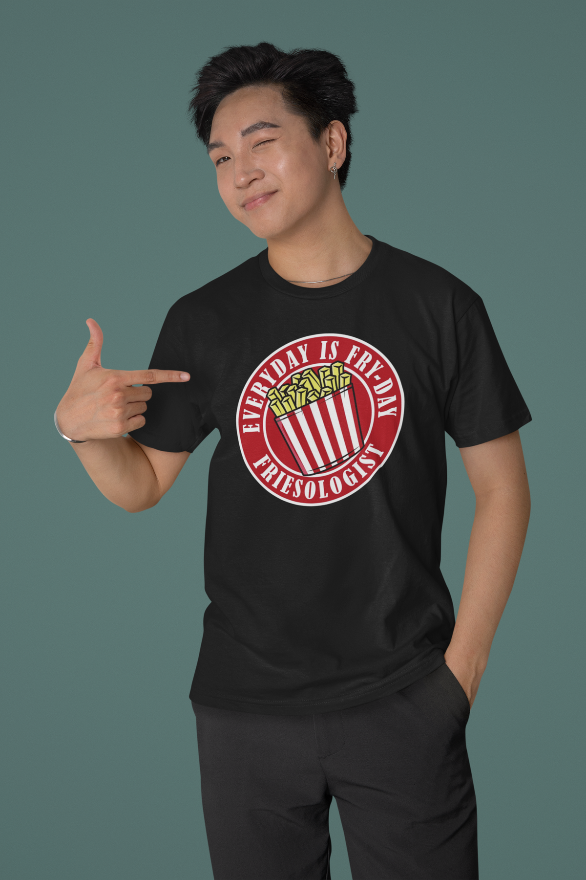 'Everyday is Fry-day' T-shirt in black, man wearing it, pointing at the print, funny foodie gift