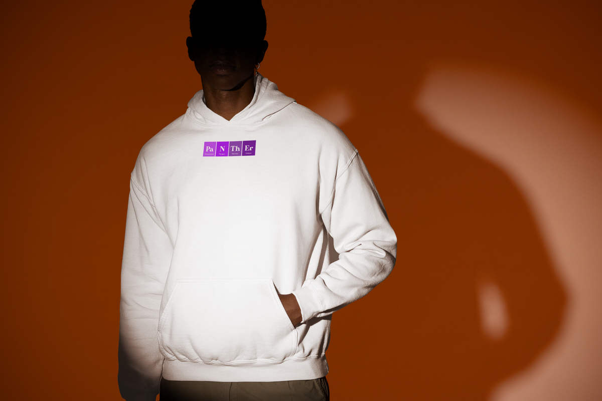 'Pa-N-Th-Er Periodic Table Hoodie' in white, man under a spotlight, Hoodie mockup, Geekpsters