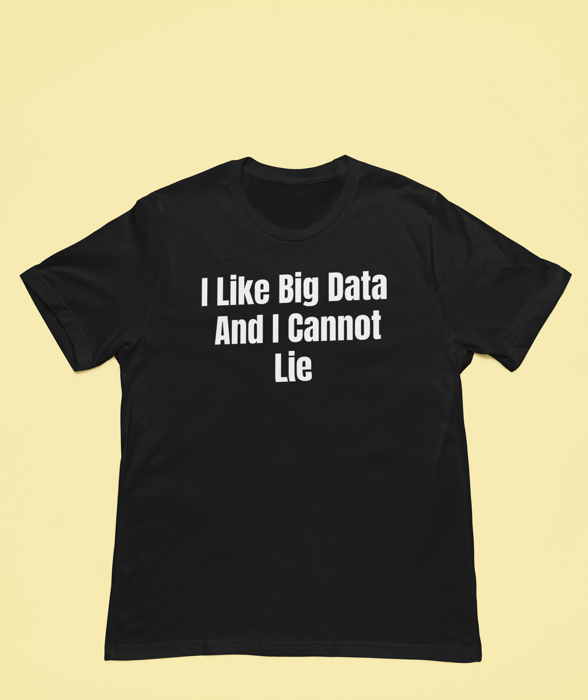 'I Like Big Data And I Cannot Lie' T-Shirt in black, flat lay on mustard backdrop, nerdy data pun tee
