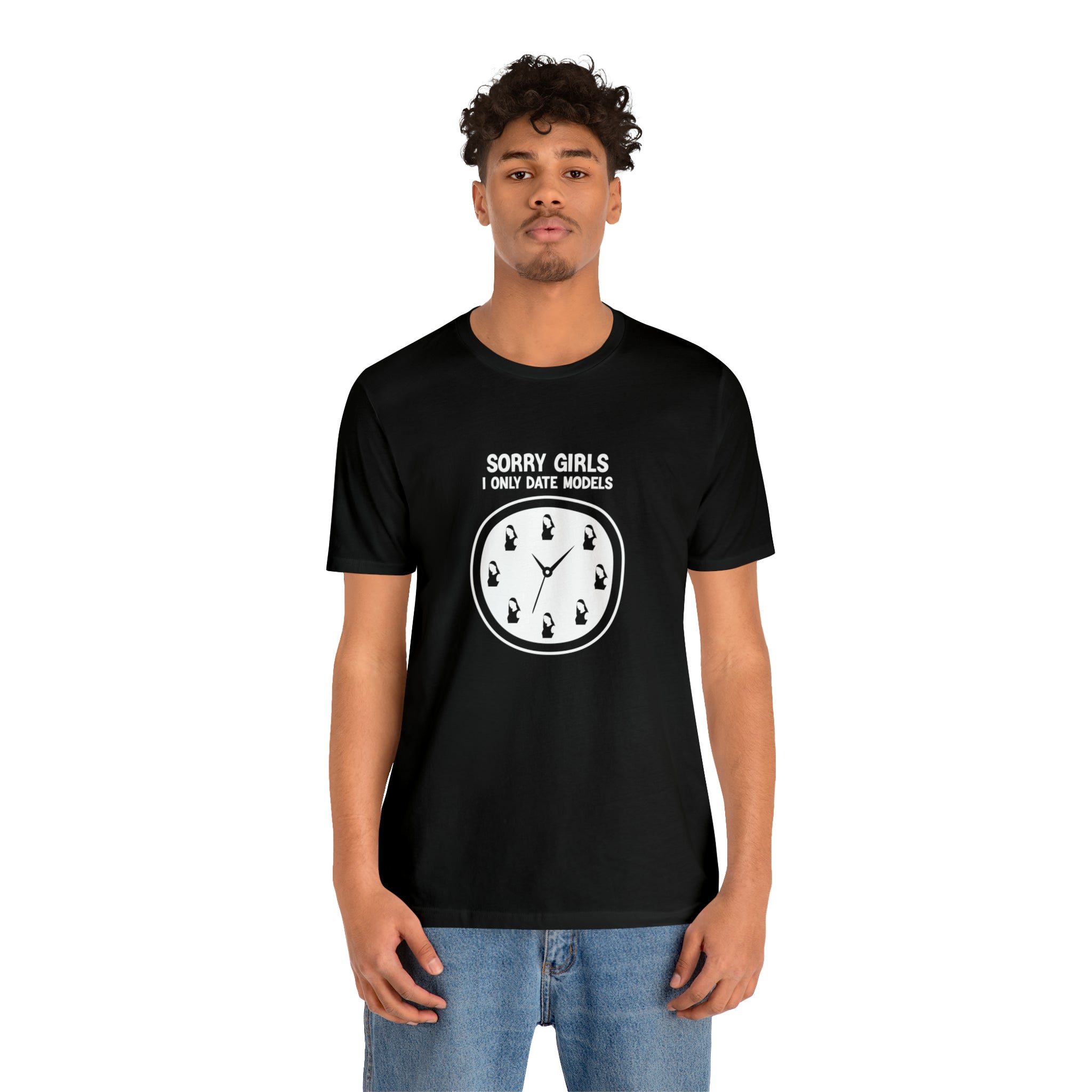 A stylish man wearing a Sorry Girls I Only Date Models T-Shirt with a bold clock print.