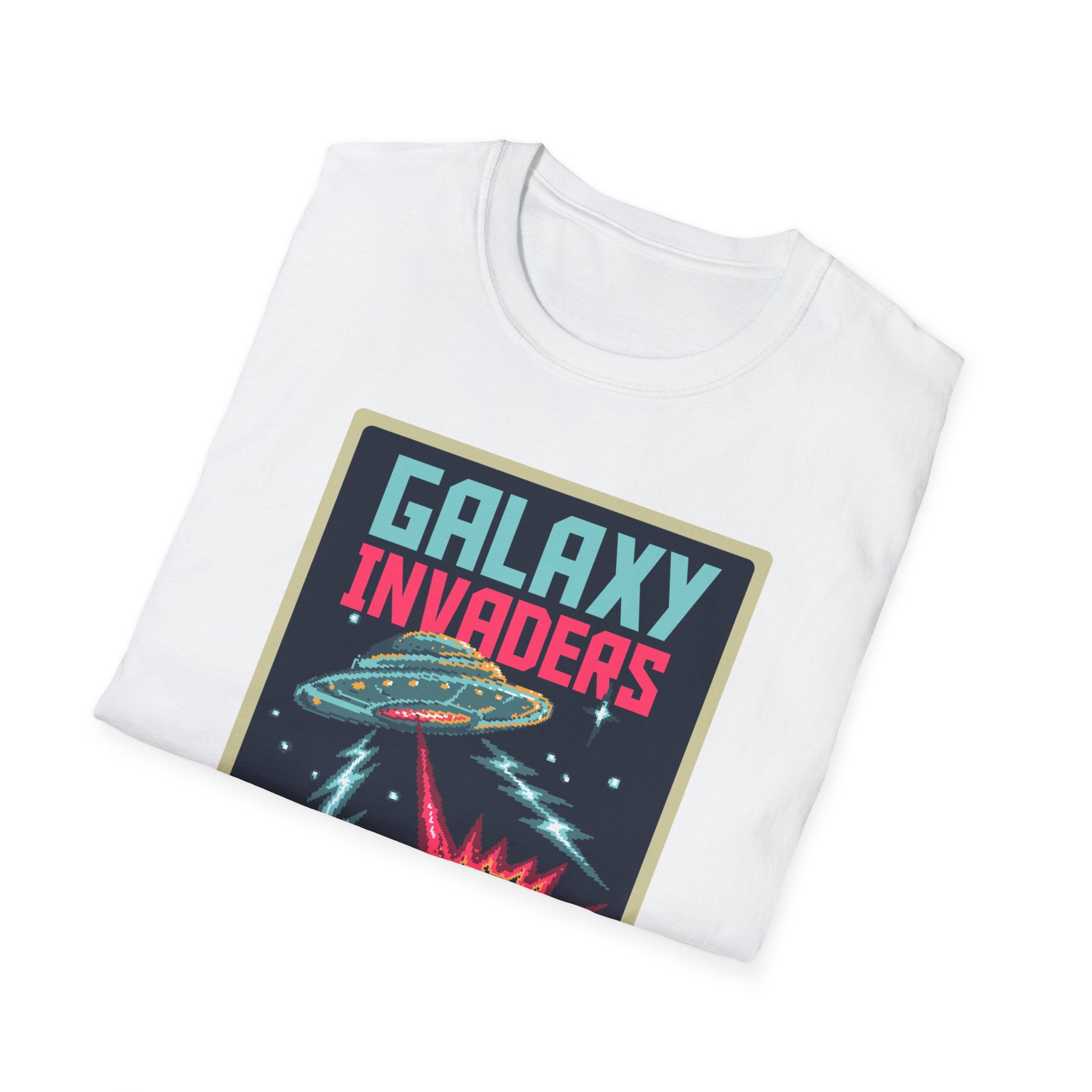 Folded "Pixel Galaxy Invaders T-Shirt" in white, showcasing a vintage-style graphic with a pixelated spaceship and retro design elements.