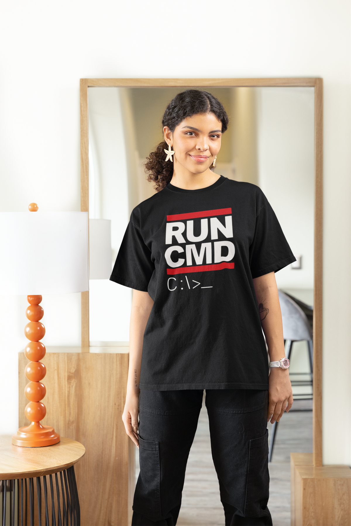 RUN CMD t-shirt in black, woman wearing it indoors near a mirror, funny gift for programmers