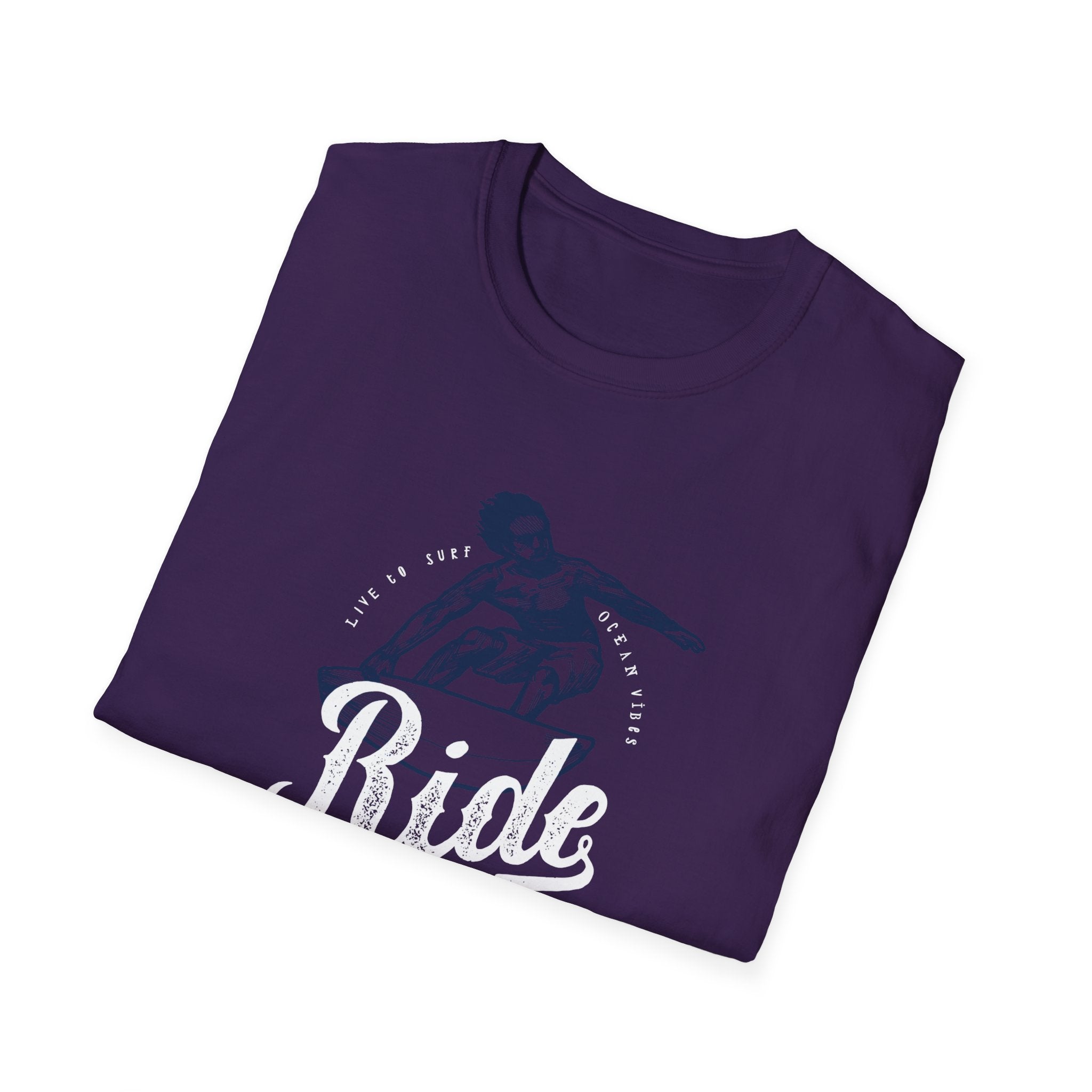 Introducing the Ride Into the Sun T-Shirt, a stylish dark purple tee featuring a graphic of a surfer alongside the phrases "Live to Surf" and "Ocean Vibes," perfect for adding flair to your trendy wardrobe.